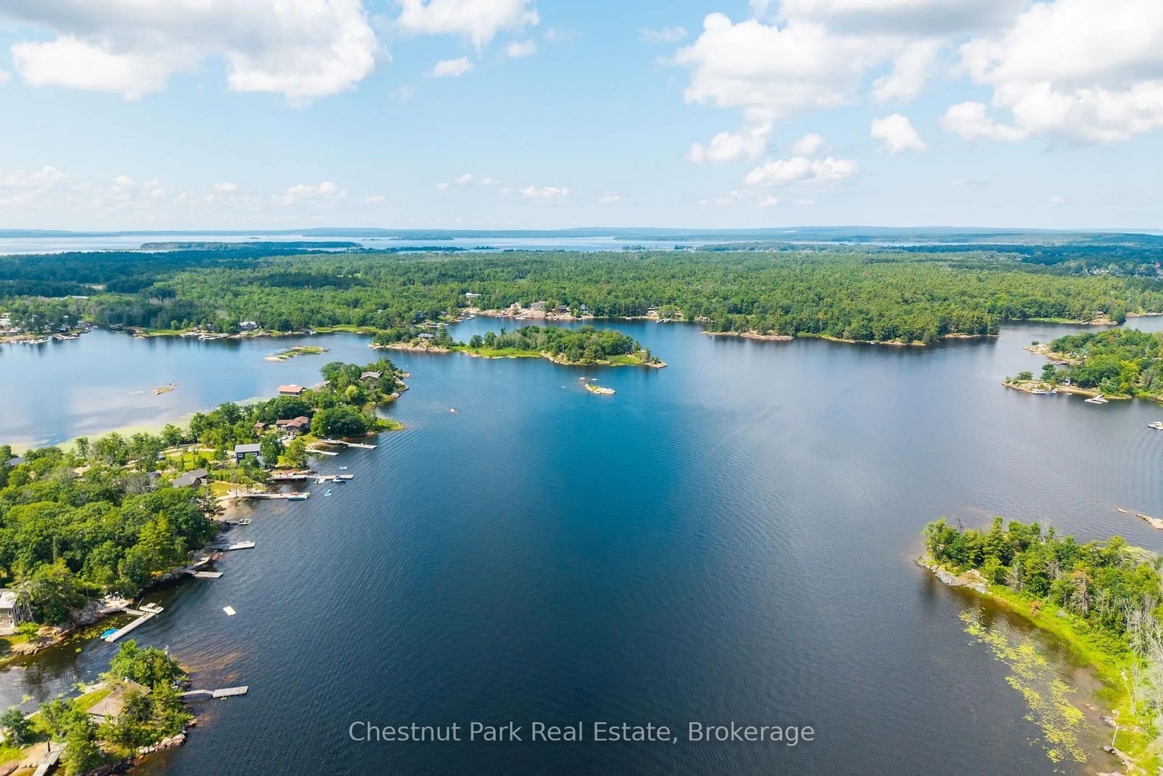 A pic from outside/outdoor area/front of a property/back of a property/a pic from drone, water/lake/river/ocean view for 300 Birch Acres Dr, Georgian Bay Ontario P0E 1E0