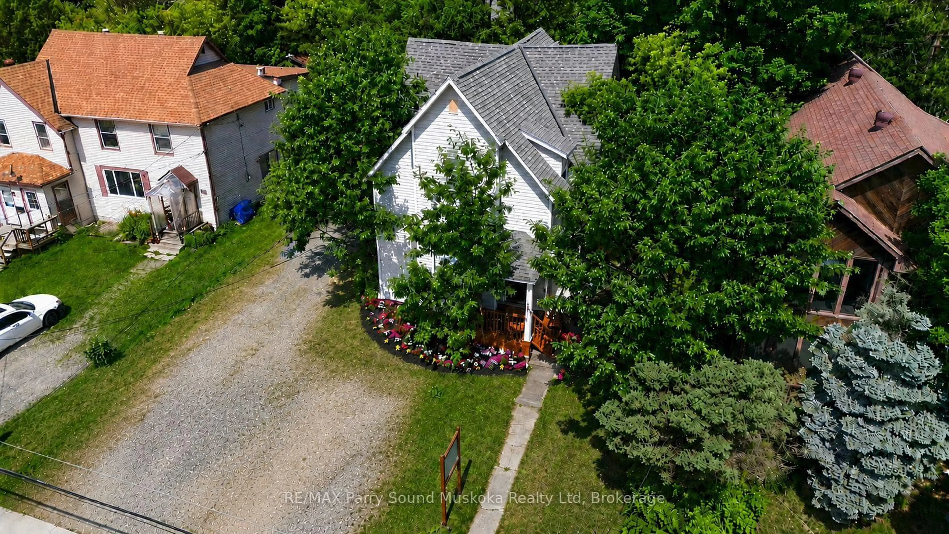 A pic from outside/outdoor area/front of a property/back of a property/a pic from drone, unknown for 18 William St, Parry Sound Ontario P2A 1V1