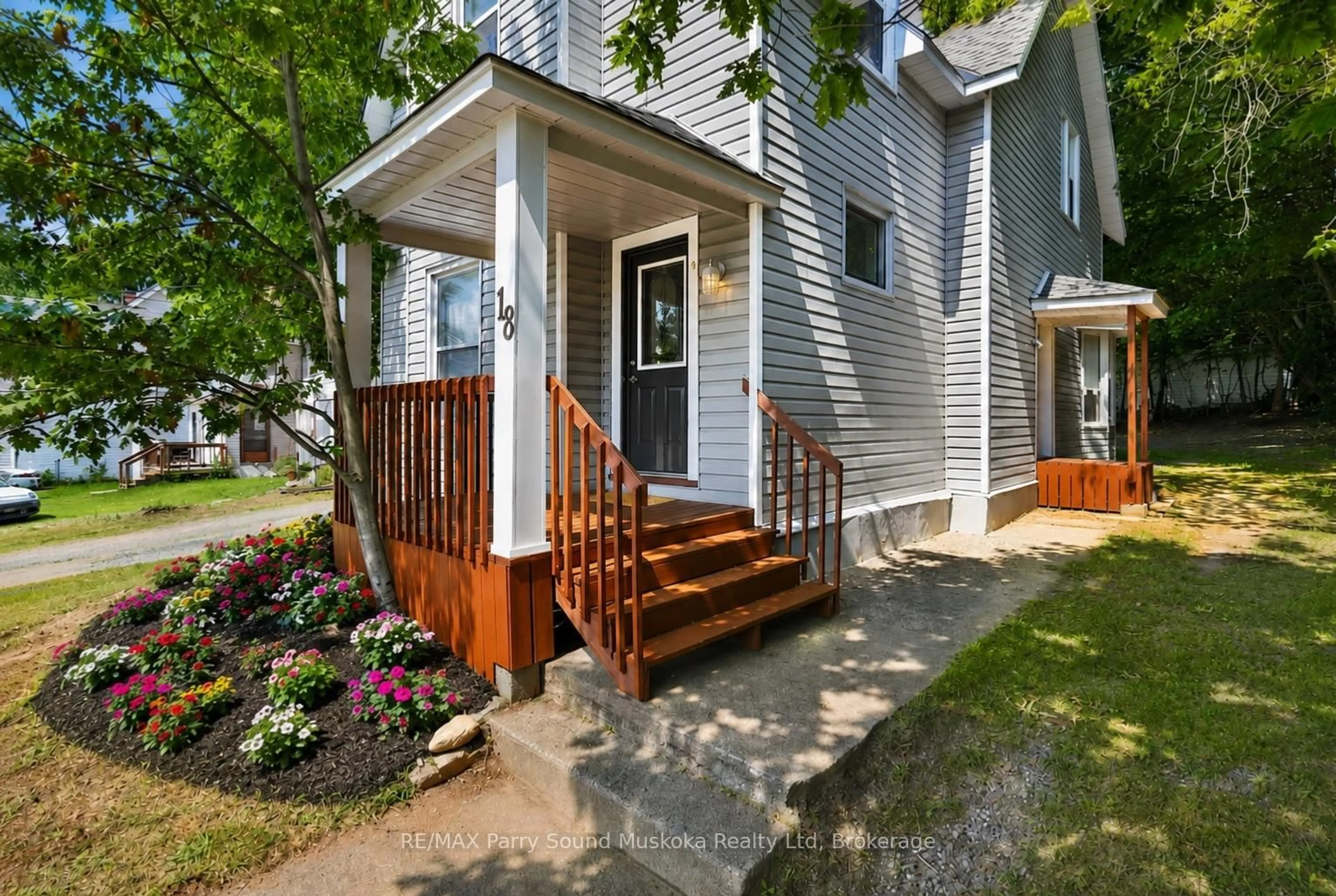 Home with vinyl exterior material, street for 18 William St, Parry Sound Ontario P2A 1V1