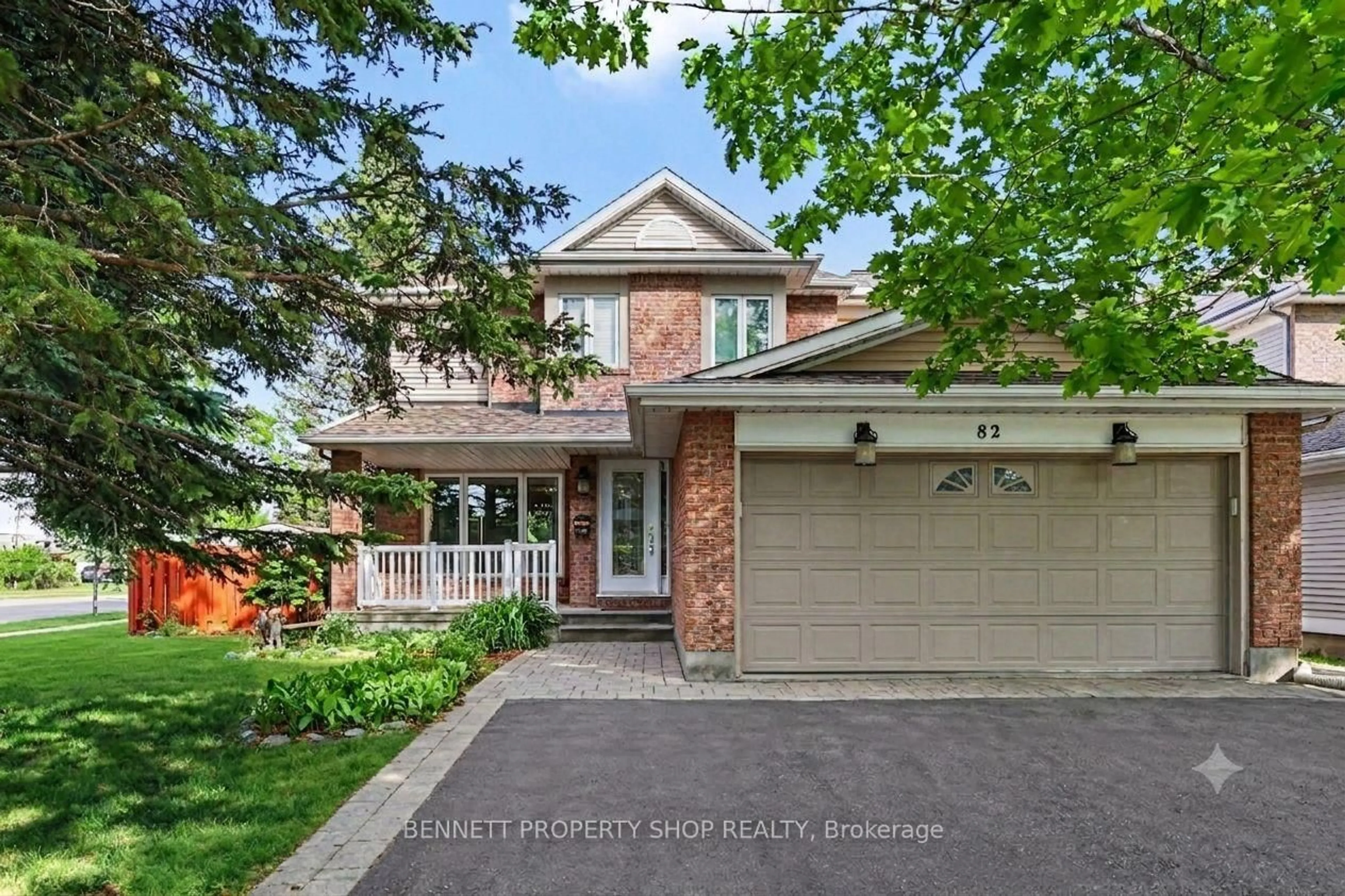 Home with brick exterior material, street for 82 Emerald Meadows Dr, Ottawa Ontario K2M 2L6