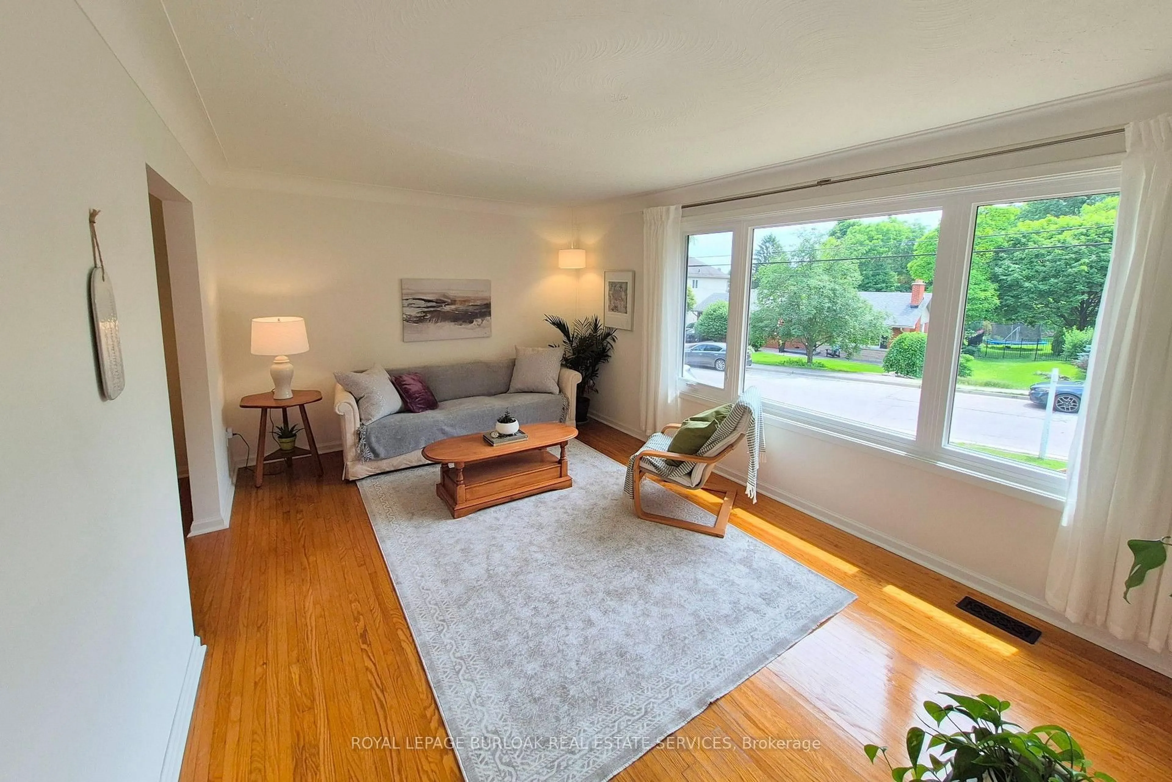 Living room with furniture, wood/laminate floor for 75 Flamboro St, Hamilton Ontario L0R 2H0