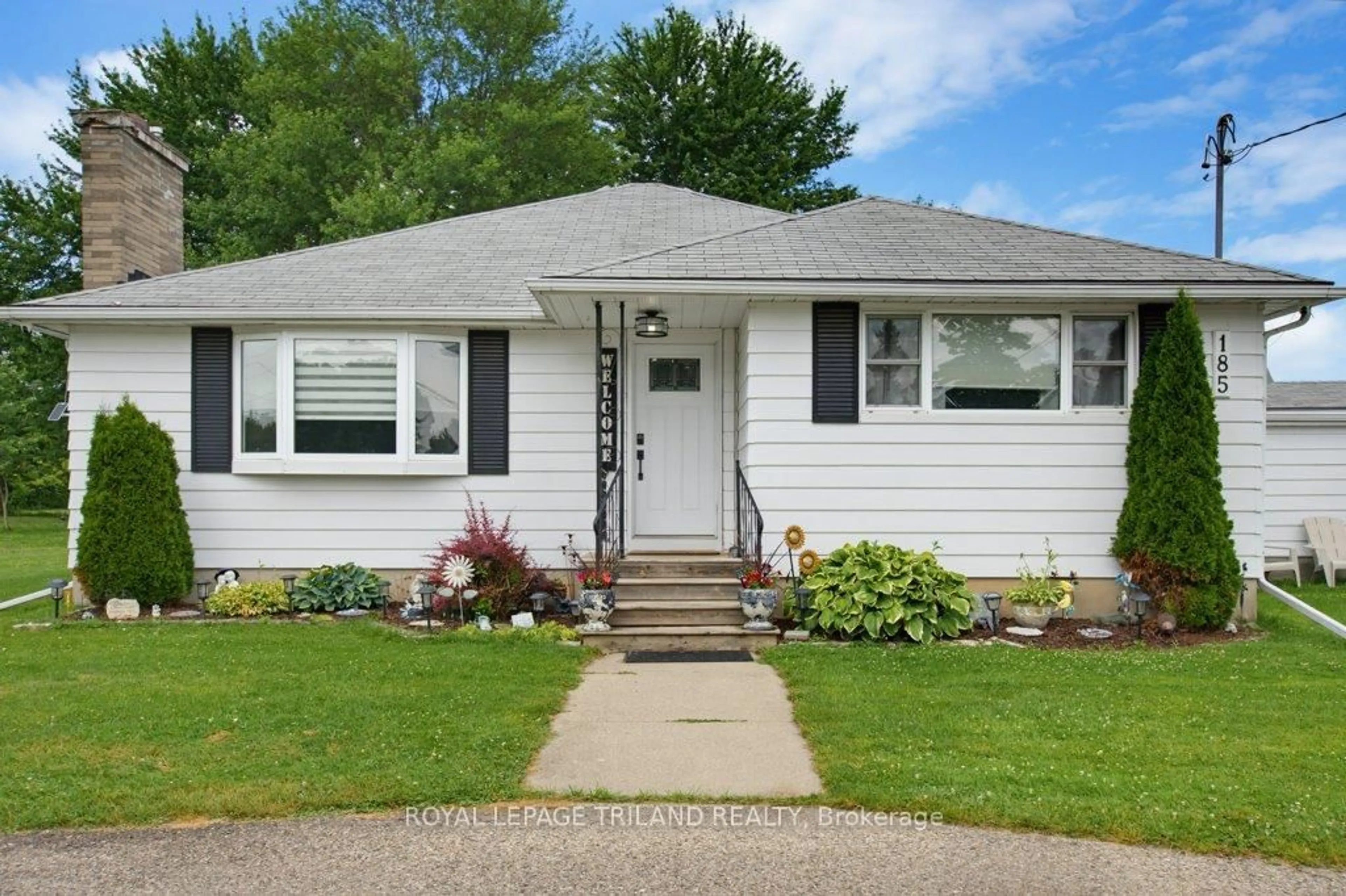 Home with vinyl exterior material, street for 185 Centennial Ave, Central Elgin Ontario N5R 5B3