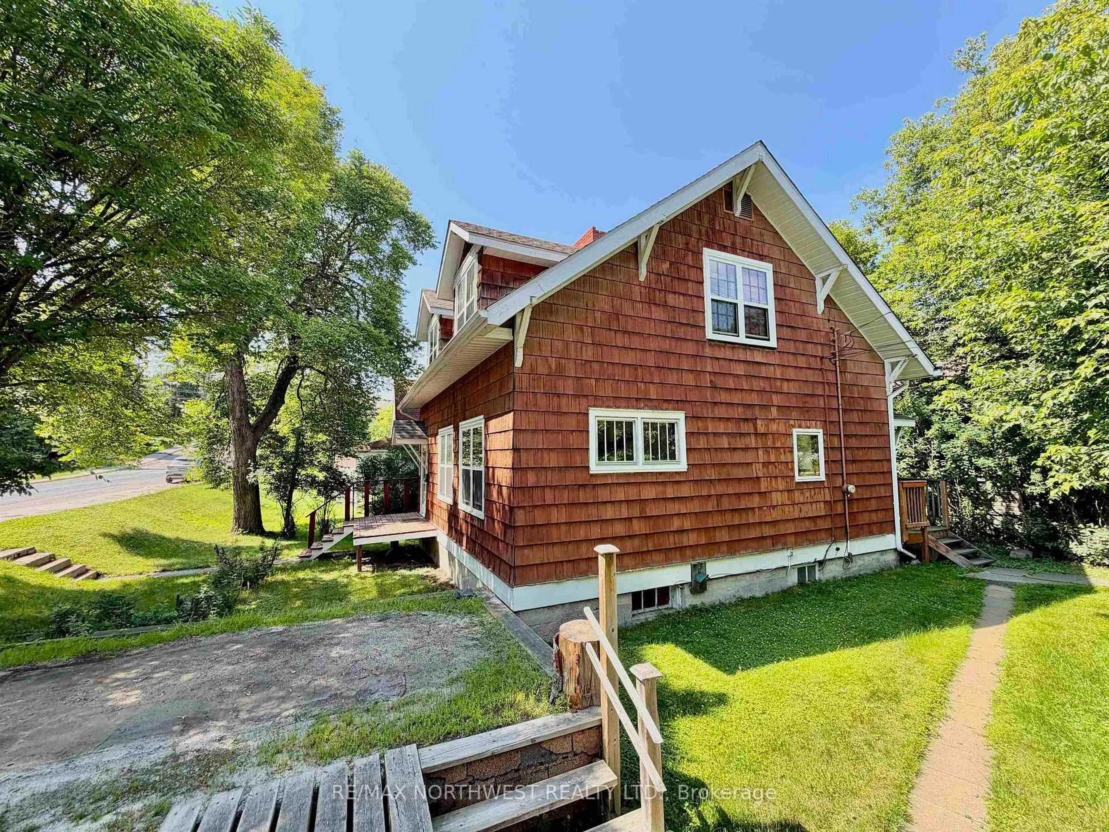 A pic from outside/outdoor area/front of a property/back of a property/a pic from drone, water/lake/river/ocean view for 214 Matheson St N, Kenora Ontario P9N 3G4