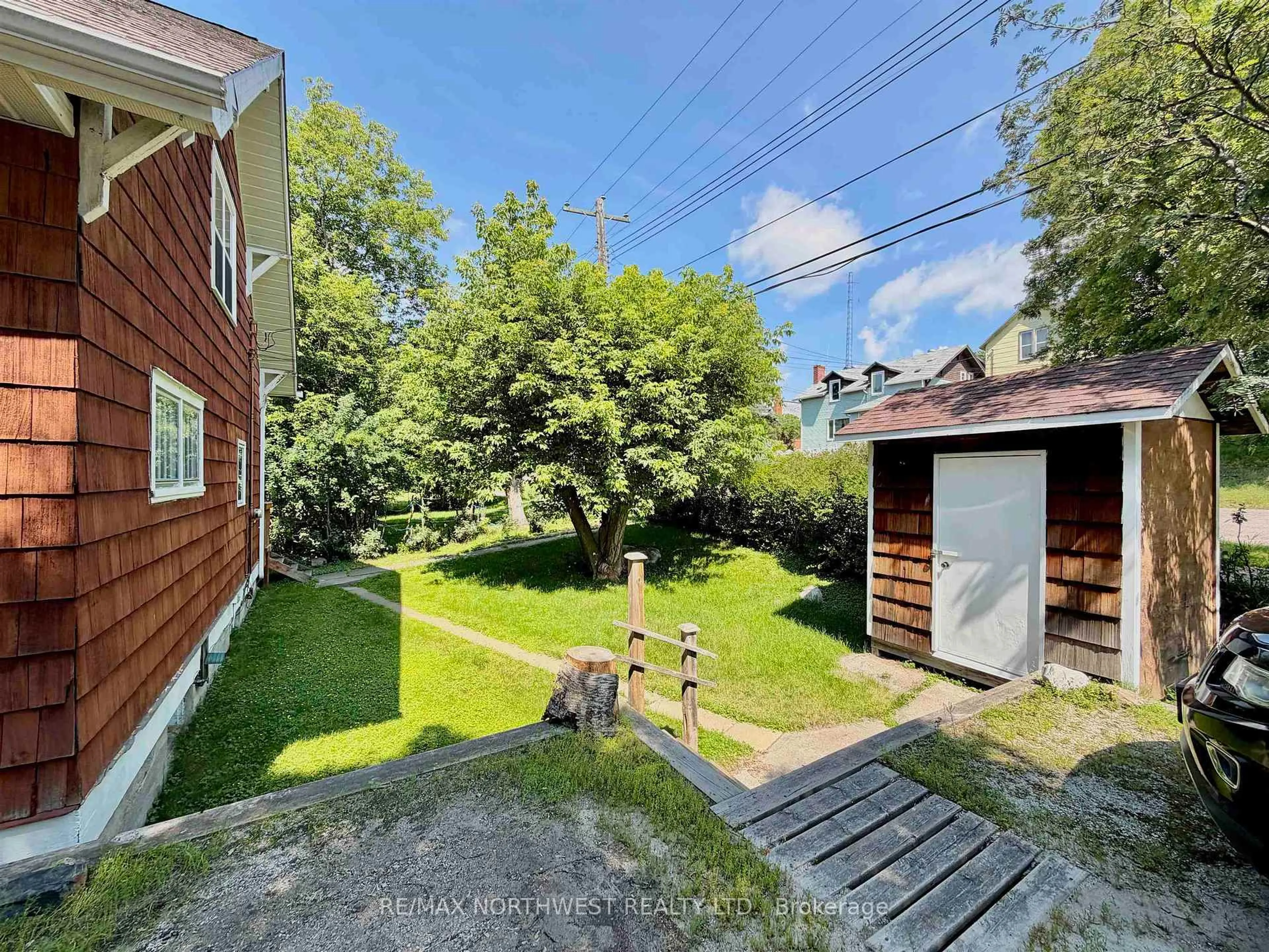 A pic from outside/outdoor area/front of a property/back of a property/a pic from drone, street for 214 Matheson St N, Kenora Ontario P9N 3G4