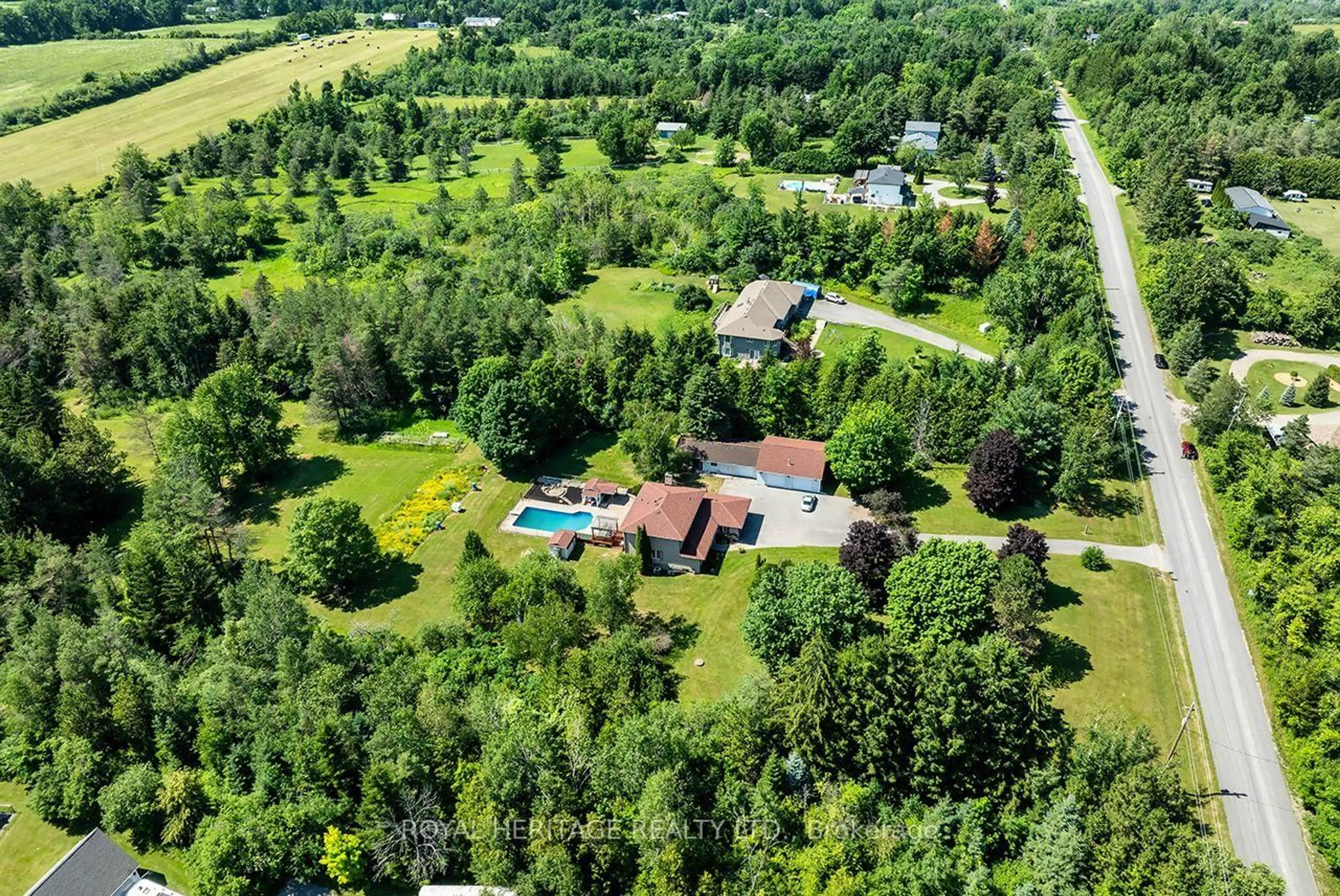 A pic from outside/outdoor area/front of a property/back of a property/a pic from drone, forest/trees view for 1238 Tapley 1/4 Line, Cavan Monaghan Ontario K0L 1V0