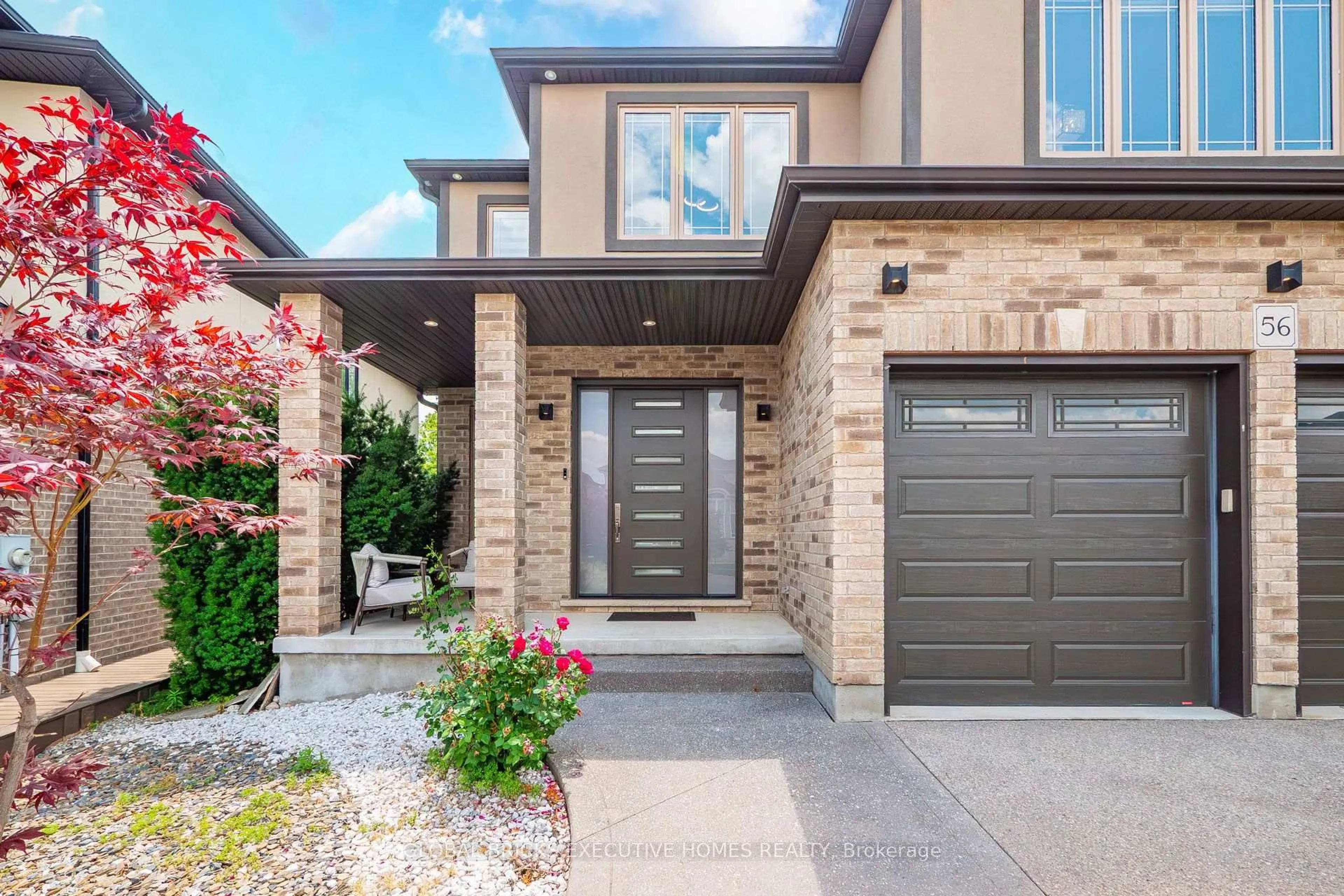 Home with brick exterior material, street for 56 Valleyscape Dr, Kitchener Ontario N2P 0G3
