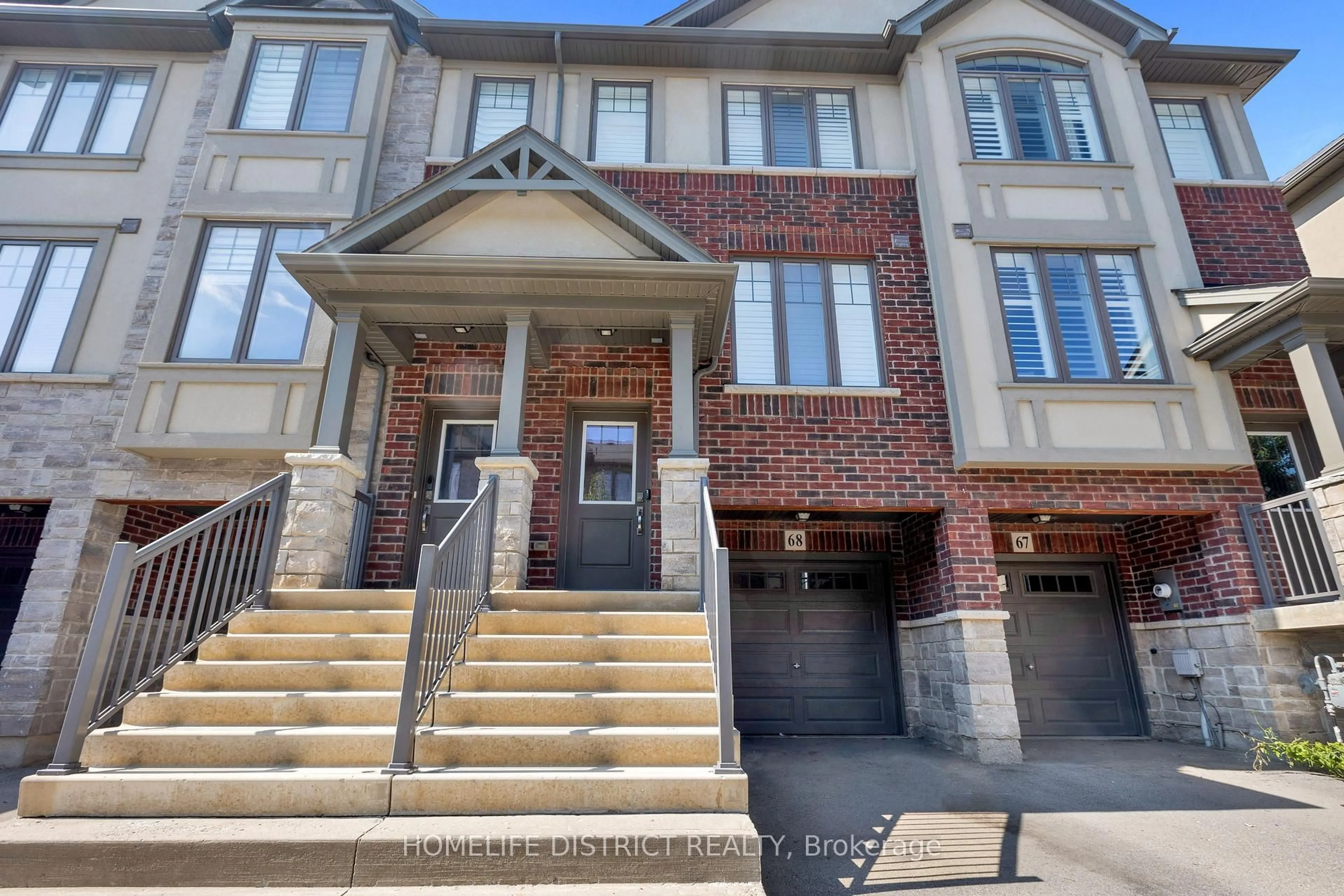 Home with brick exterior material, street for 1169 Garner Rd #68, Hamilton Ontario L9G 0G8