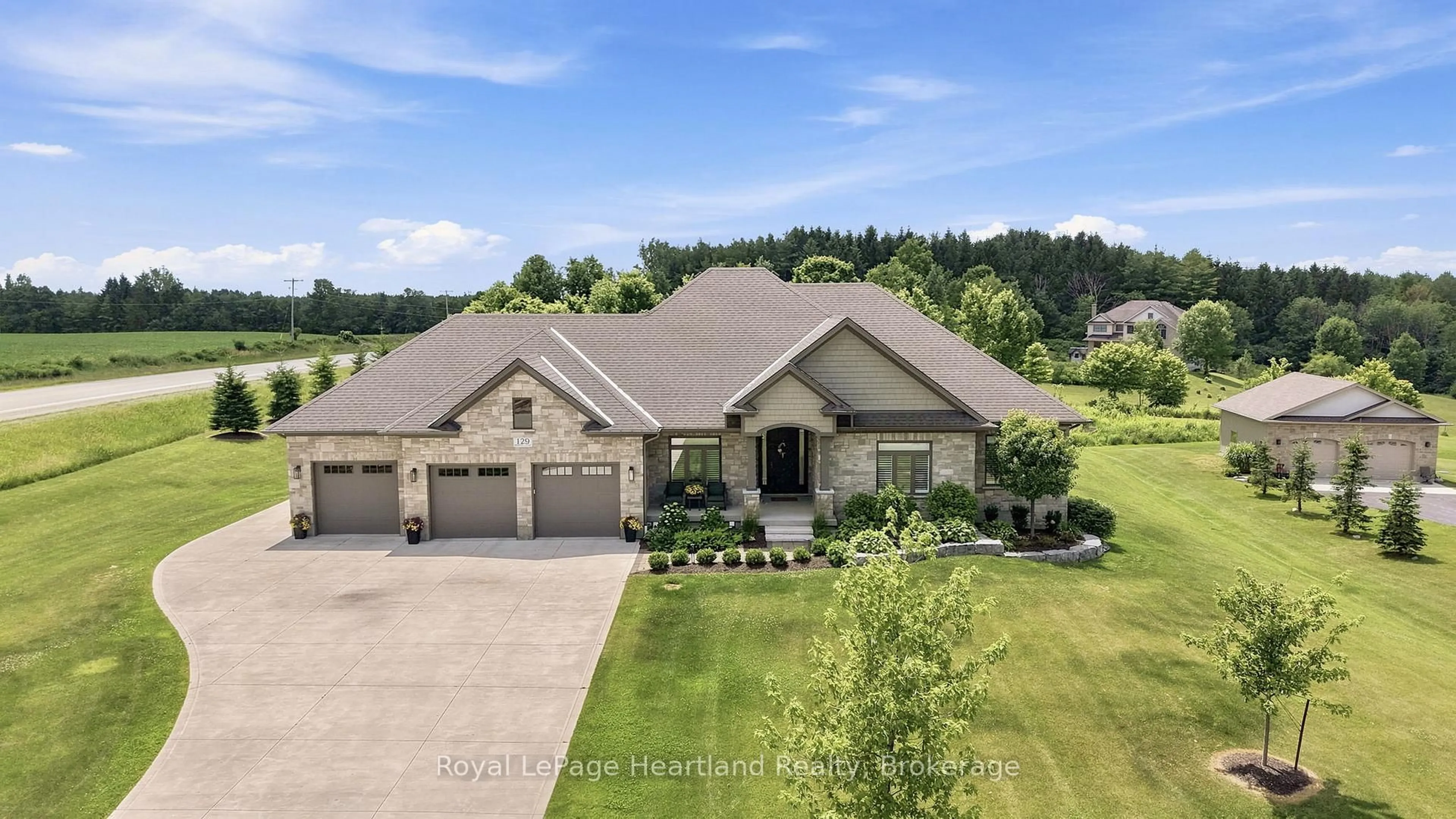 A pic from outside/outdoor area/front of a property/back of a property/a pic from drone, unknown for 129 Sharron Crt, Mapleton Ontario N0G 2K0