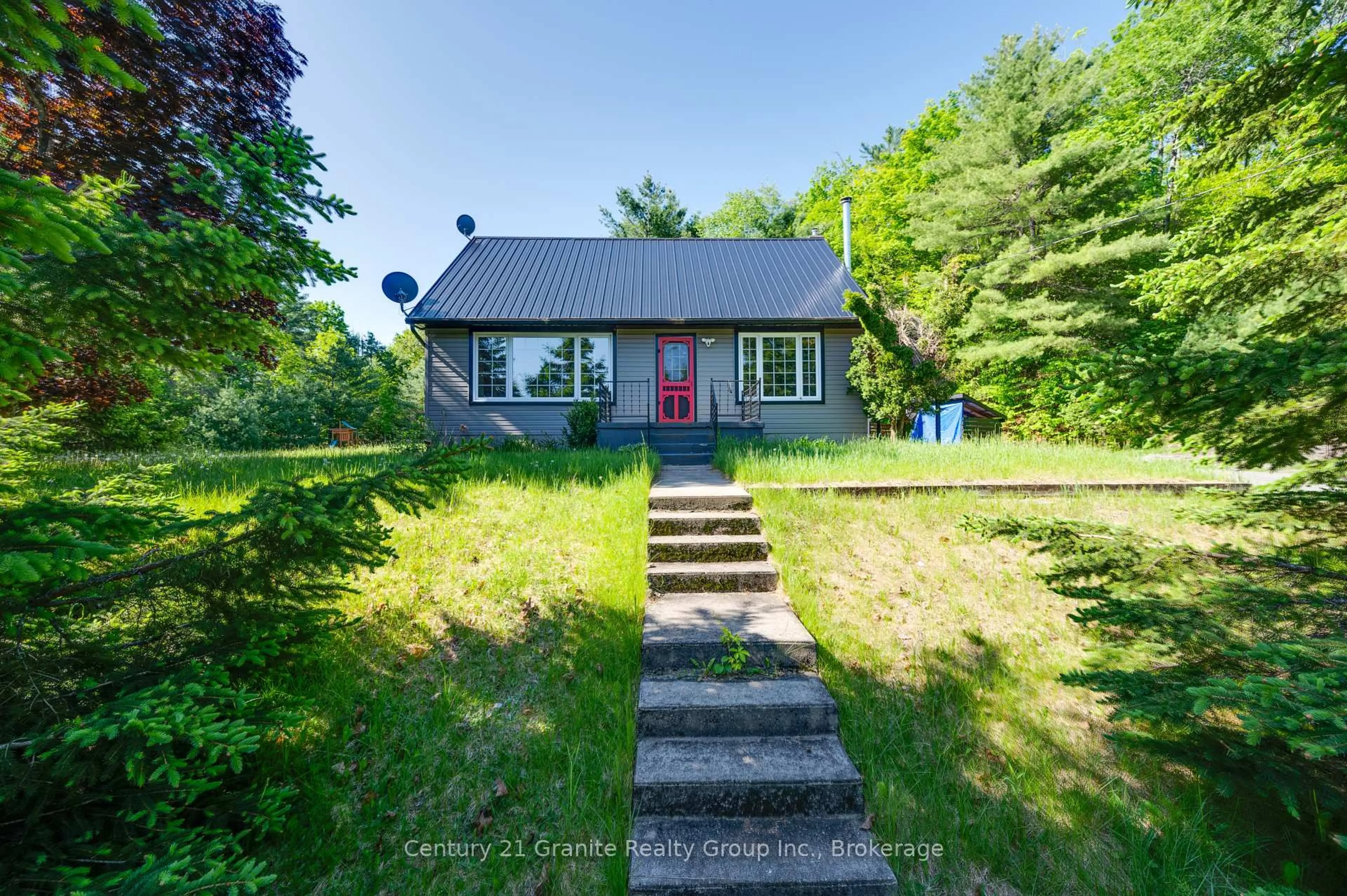 A pic from outside/outdoor area/front of a property/back of a property/a pic from drone, street for 26733 Highway 62, Bancroft Ontario K0L 2L0