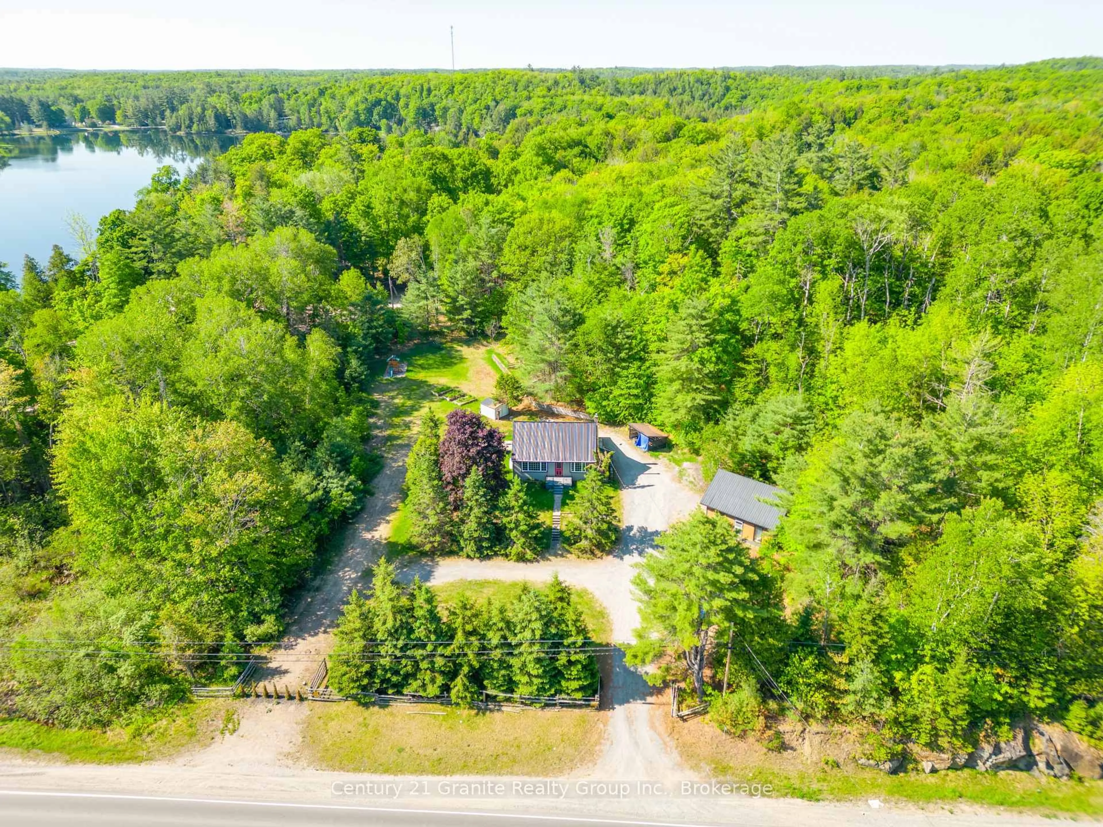 A pic from outside/outdoor area/front of a property/back of a property/a pic from drone, water/lake/river/ocean view for 26733 Highway 62, Bancroft Ontario K0L 2L0