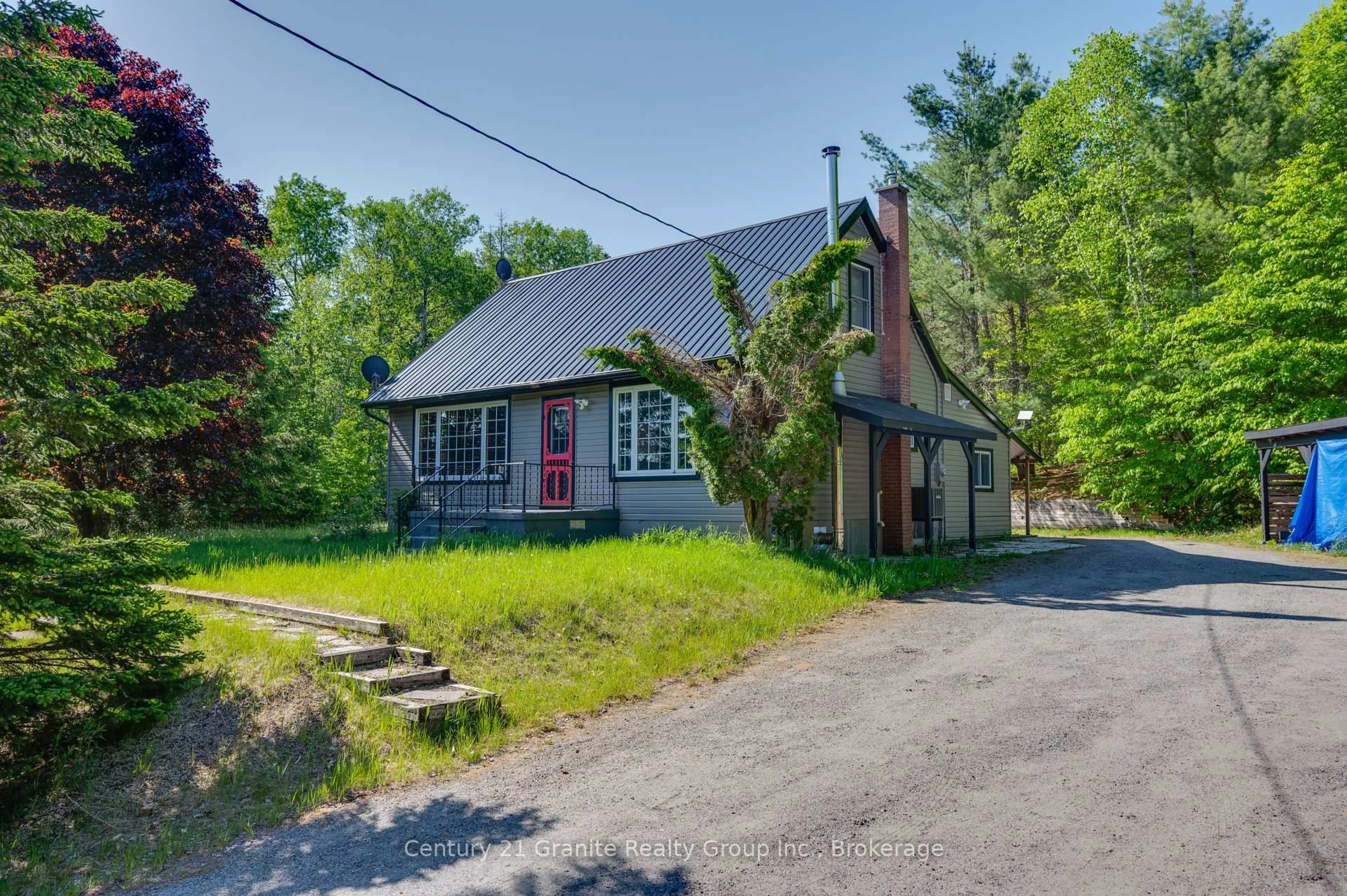 A pic from outside/outdoor area/front of a property/back of a property/a pic from drone, street for 26733 Highway 62, Bancroft Ontario K0L 2L0