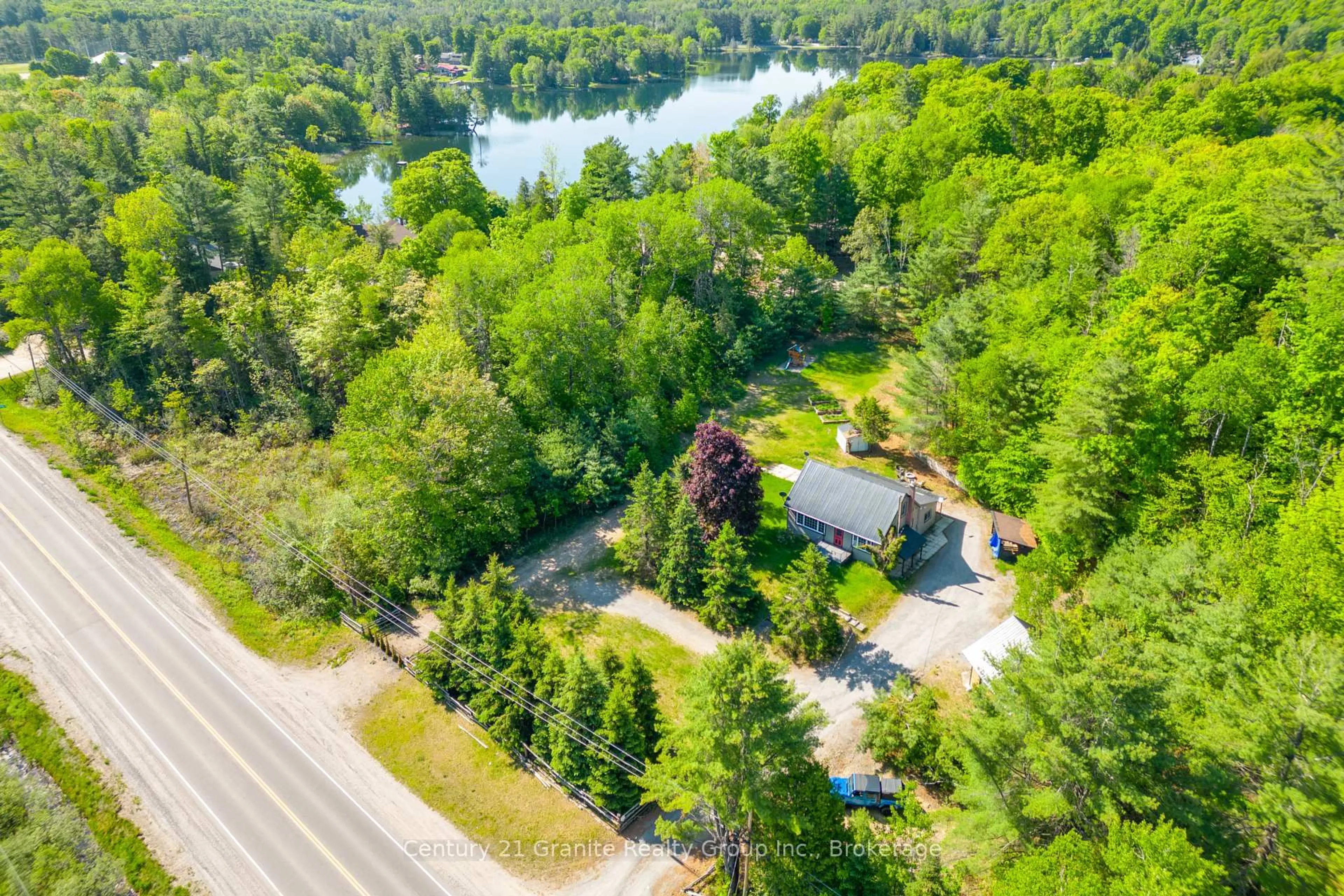 A pic from outside/outdoor area/front of a property/back of a property/a pic from drone, water/lake/river/ocean view for 26733 Highway 62, Bancroft Ontario K0L 2L0