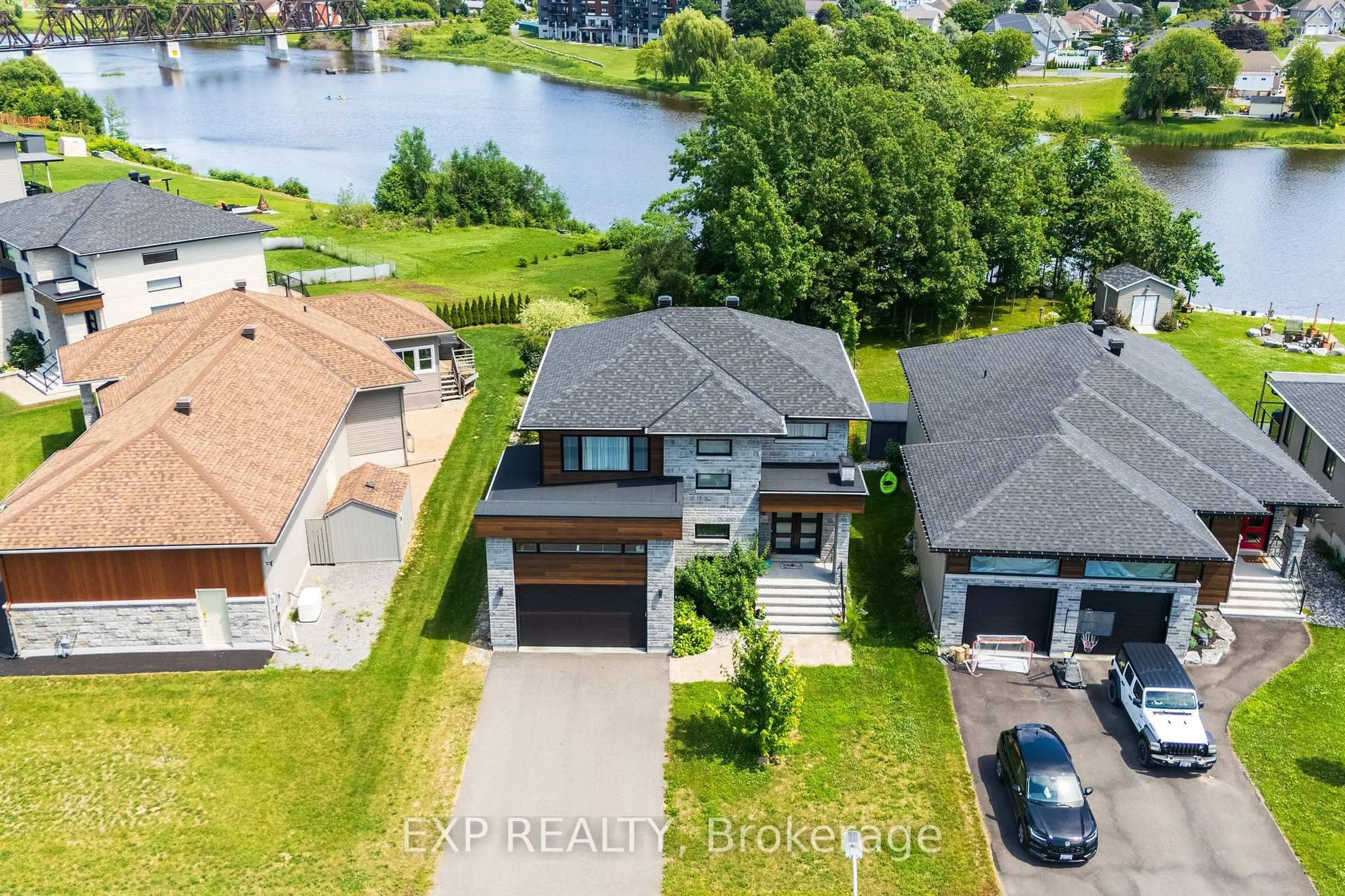 A pic from outside/outdoor area/front of a property/back of a property/a pic from drone, water/lake/river/ocean view for 144 Argile St, Casselman Ontario K0A 1M0