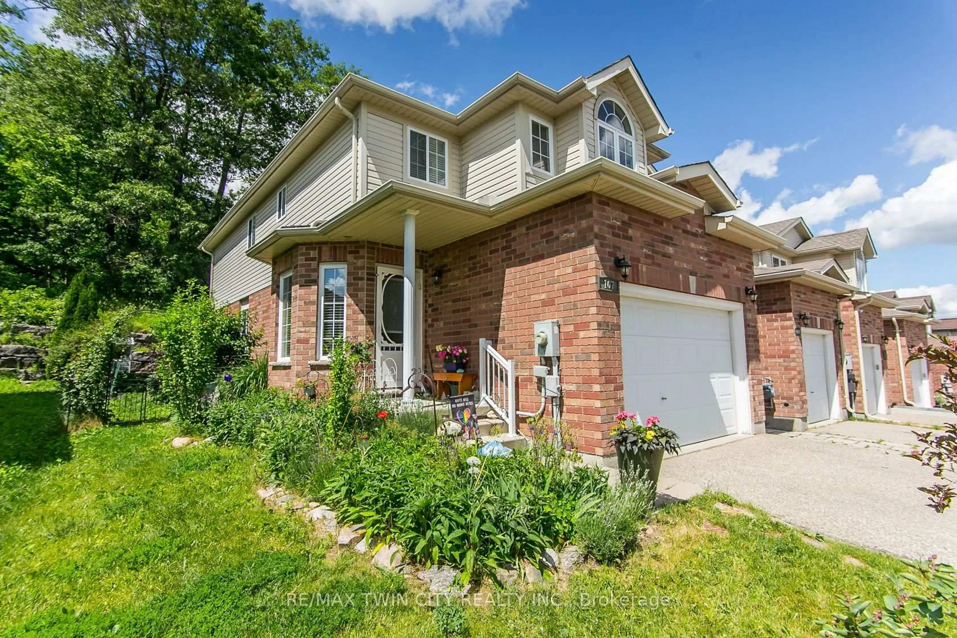 Home with brick exterior material, street for 107 Upper Mercer St, Kitchener Ontario N2A 4N1
