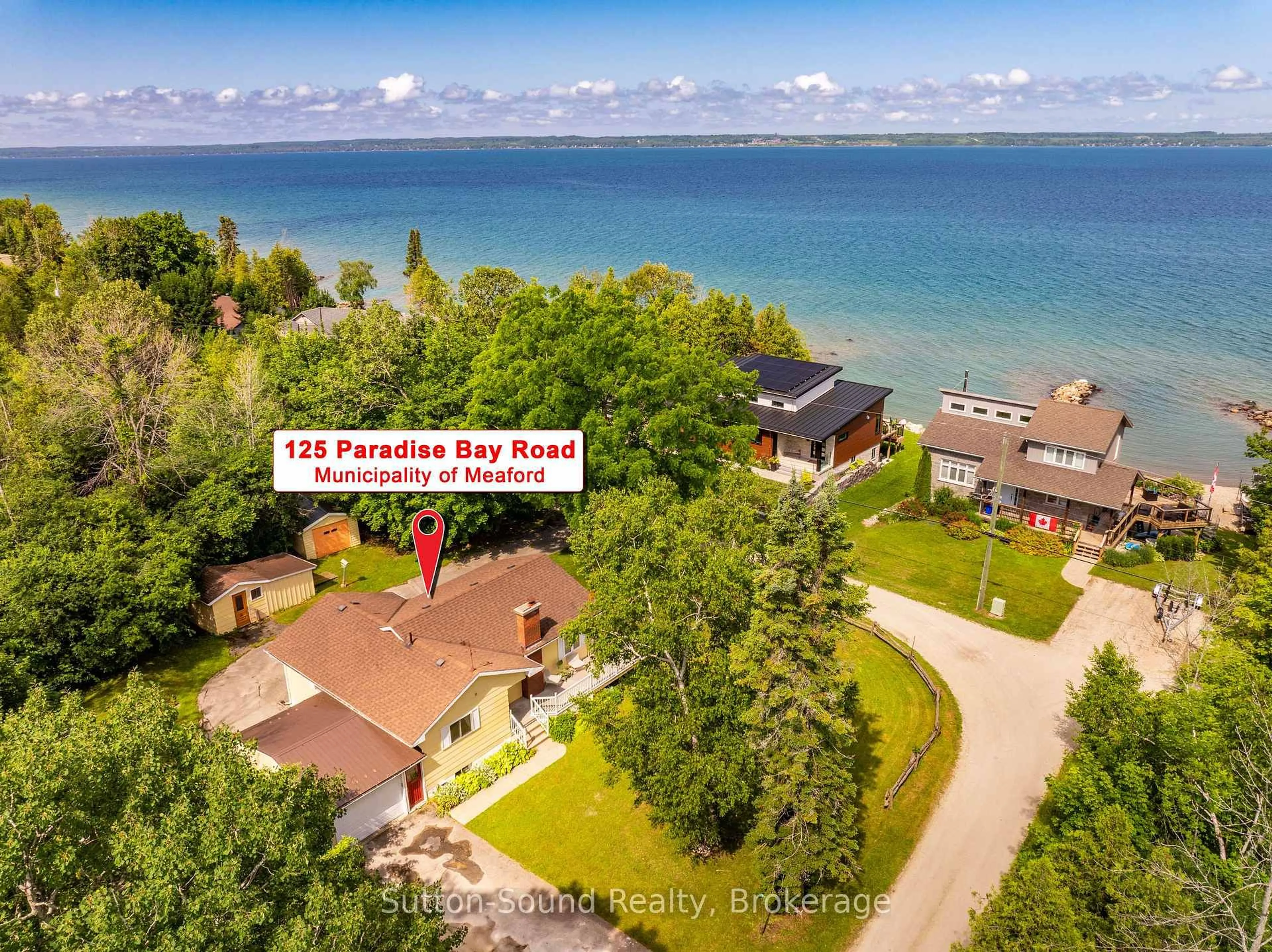 A pic from outside/outdoor area/front of a property/back of a property/a pic from drone, water/lake/river/ocean view for 125 Paradise Bay Rd, Meaford Ontario N0H 1B0