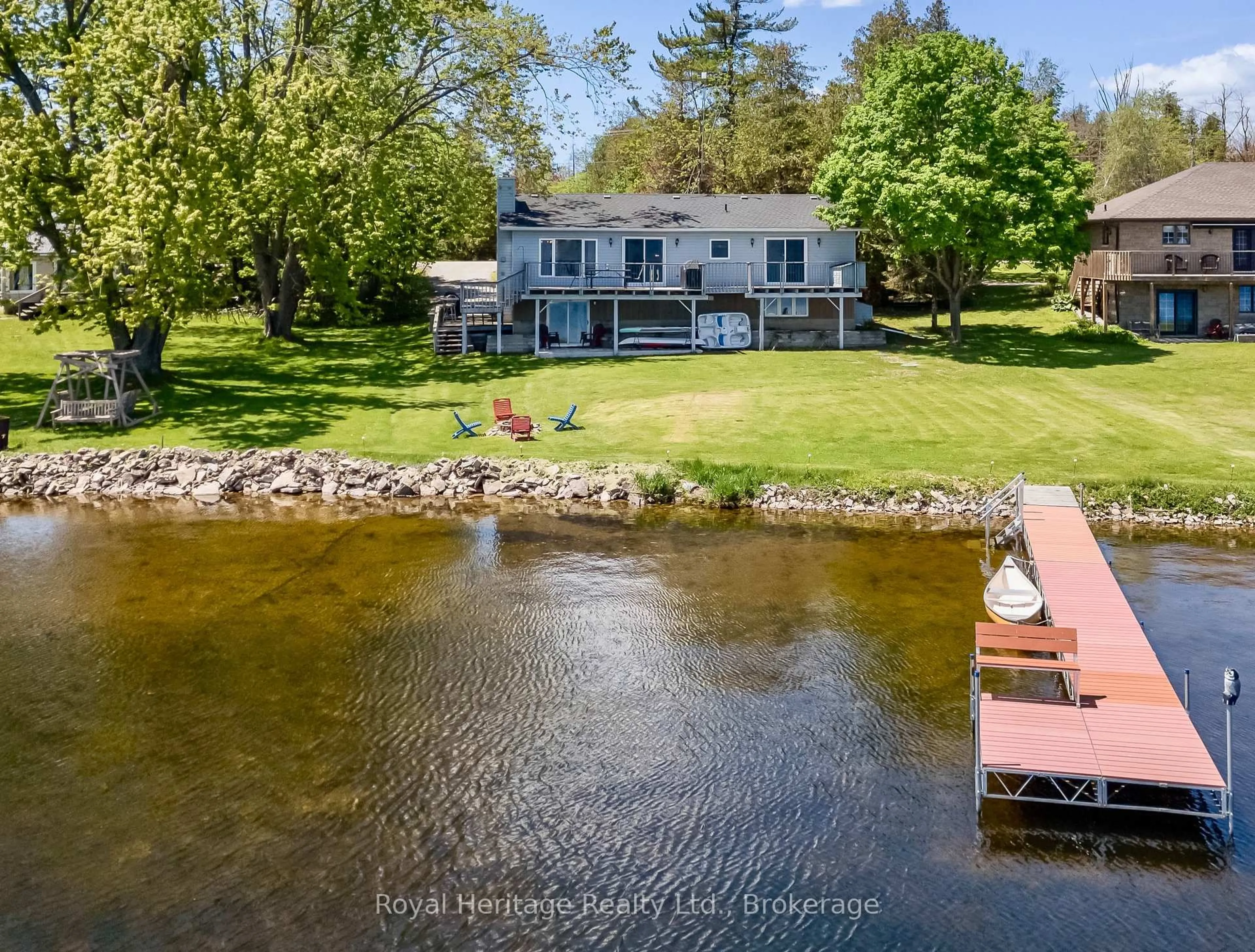 A pic from outside/outdoor area/front of a property/back of a property/a pic from drone, water/lake/river/ocean view for 62 Bettys Bay Rd, Kawartha Lakes Ontario K0M 1G0