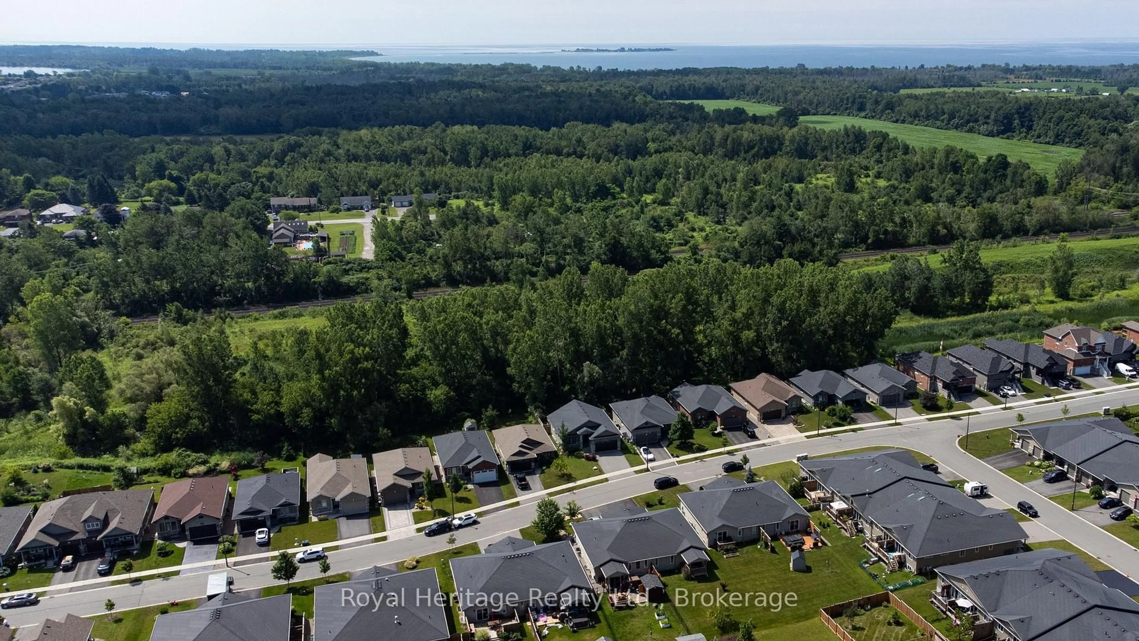 A pic from outside/outdoor area/front of a property/back of a property/a pic from drone, water/lake/river/ocean view for 86 Royal Gala Dr, Brighton Ontario K0K 1H0