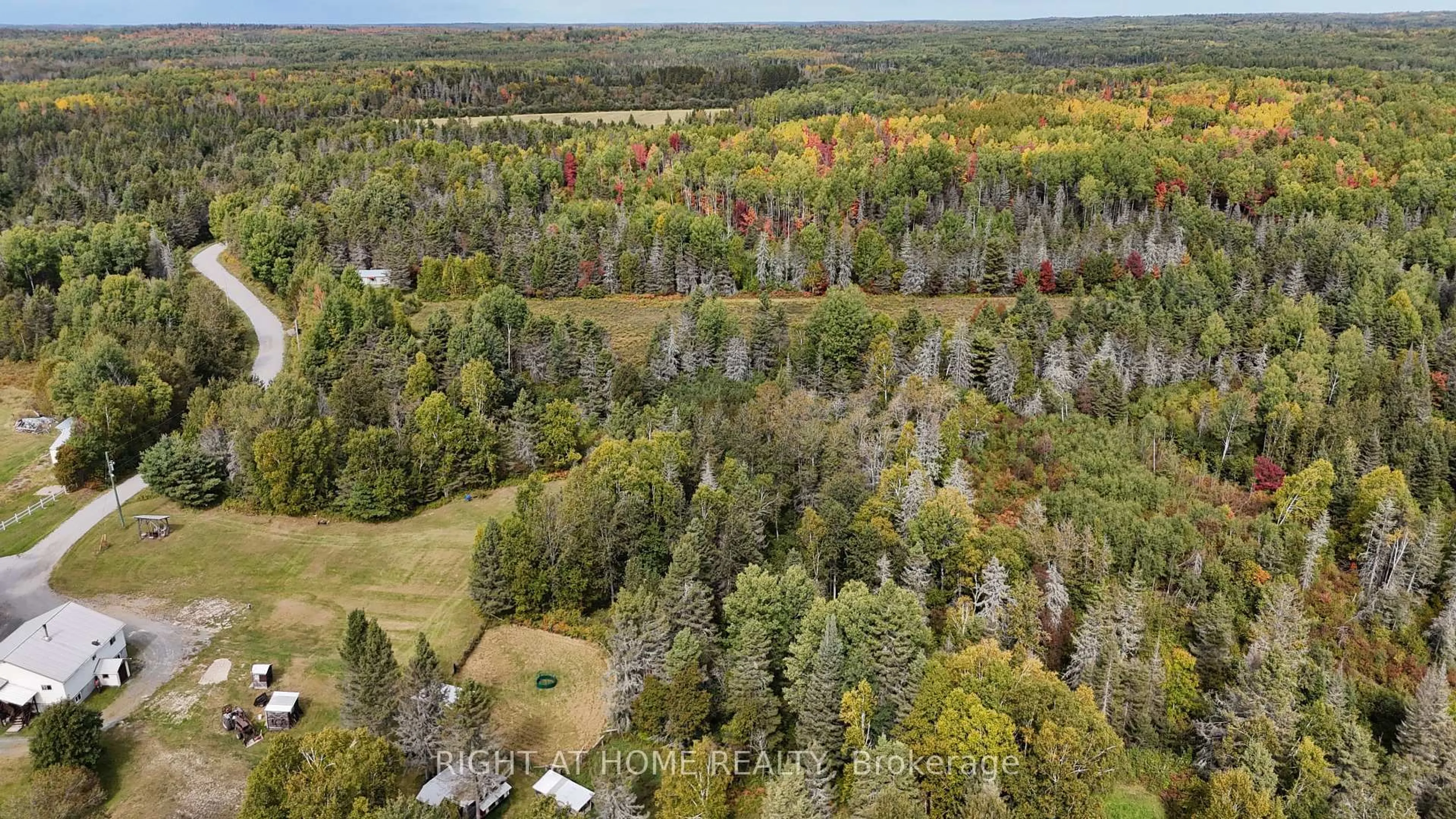 A pic from outside/outdoor area/front of a property/back of a property/a pic from drone, forest/trees view for 58 Bellefeuille Rd, West Nipissing Ontario P0H 1M0