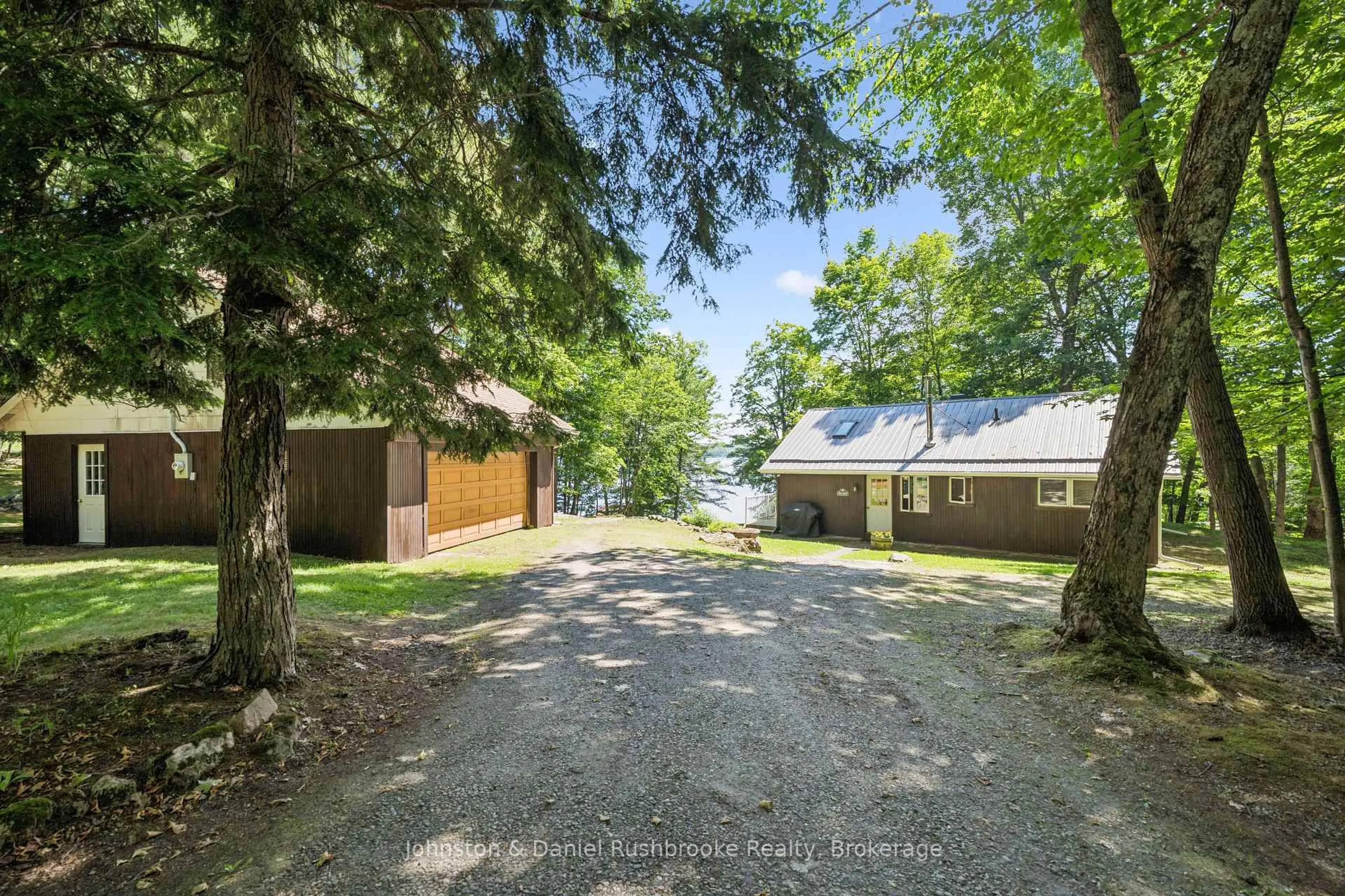 A pic from outside/outdoor area/front of a property/back of a property/a pic from drone, unknown for 1155 Stephen Rd #8, Muskoka Lakes Ontario P0B 1J0