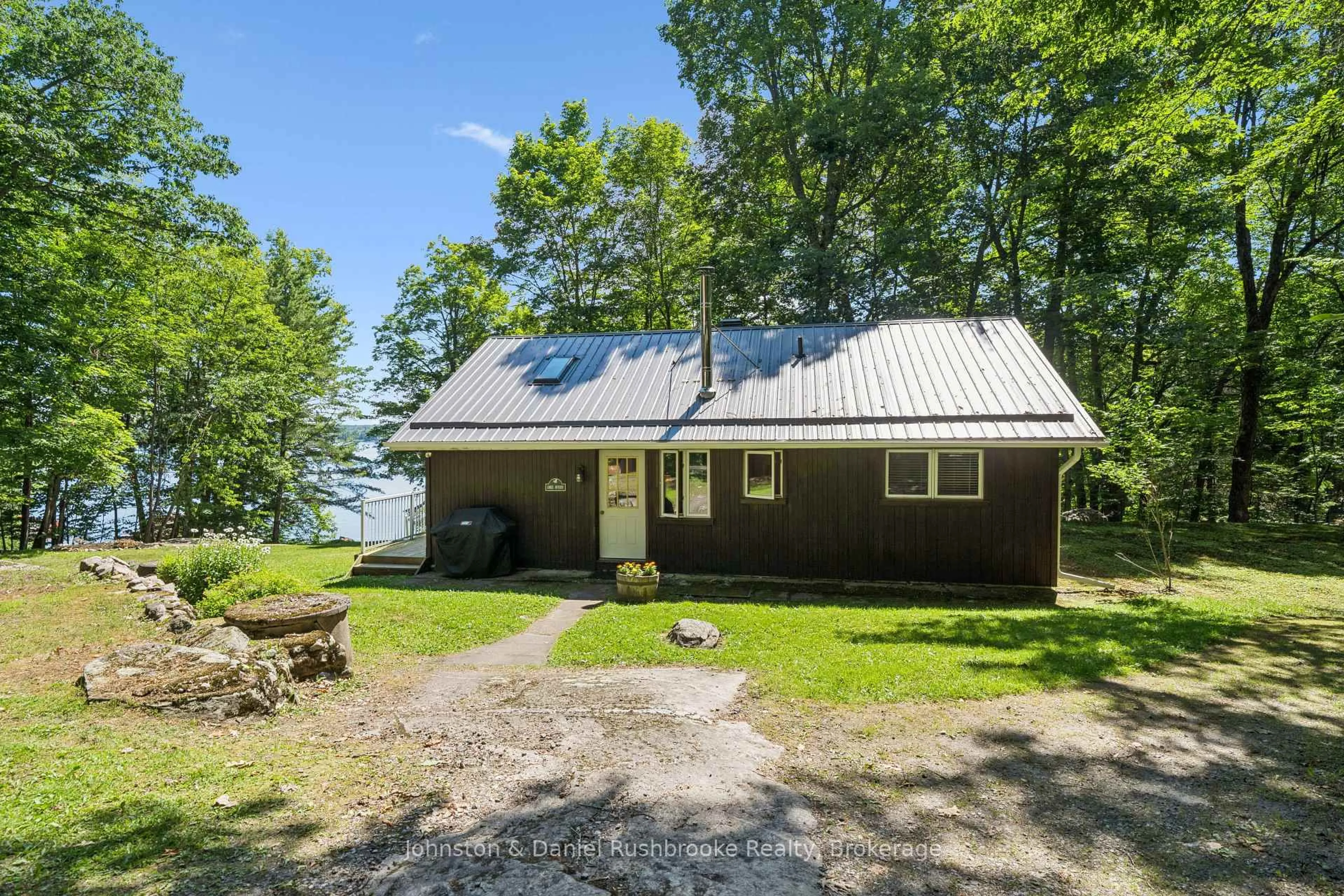 A pic from outside/outdoor area/front of a property/back of a property/a pic from drone, water/lake/river/ocean view for 1155 Stephen Rd #8, Muskoka Lakes Ontario P0B 1J0