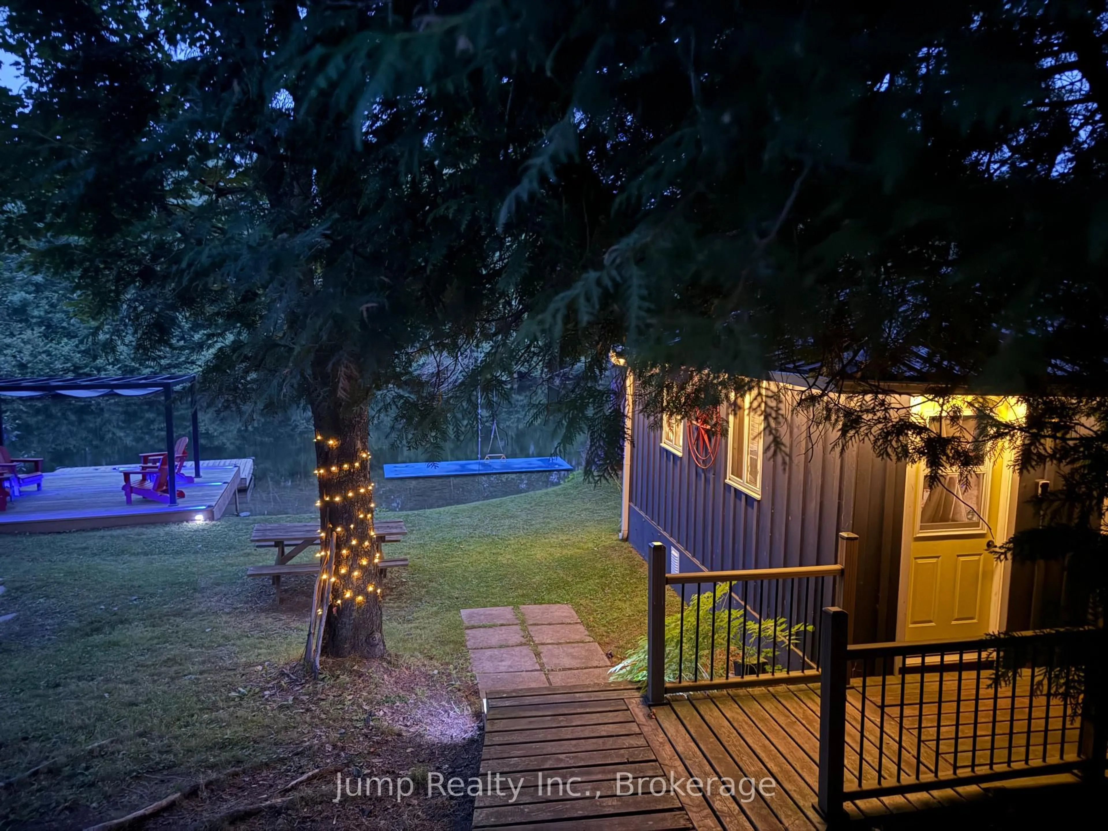 A pic from outside/outdoor area/front of a property/back of a property/a pic from drone, forest/trees view for 4228 Deep Bay Rd, Minden Hills Ontario K0M 2K0