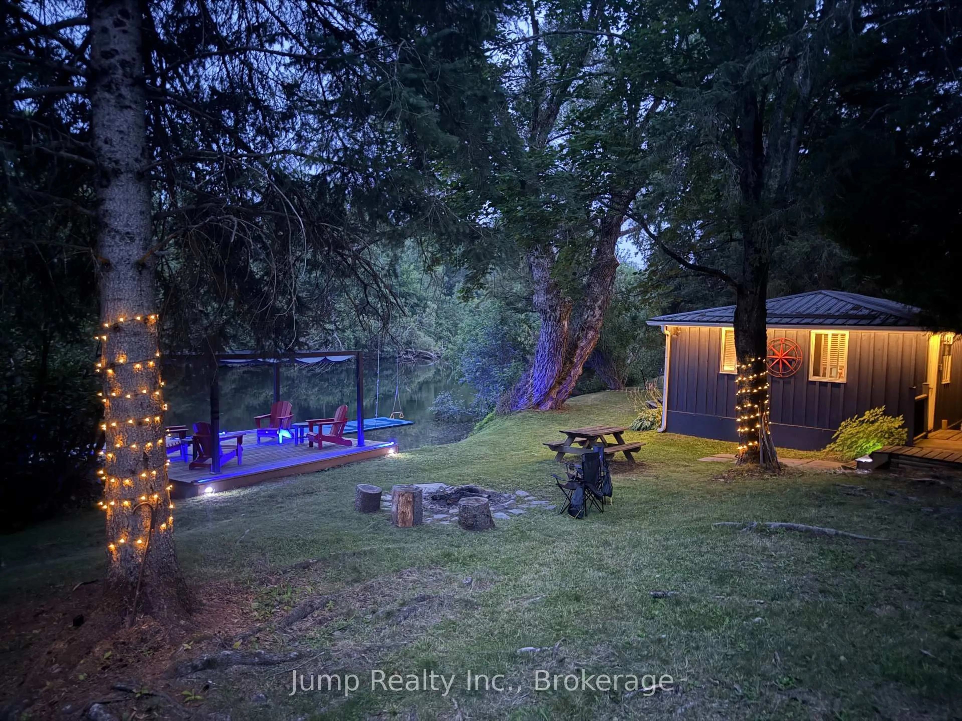 A pic from outside/outdoor area/front of a property/back of a property/a pic from drone, forest/trees view for 4228 Deep Bay Rd, Minden Hills Ontario K0M 2K0