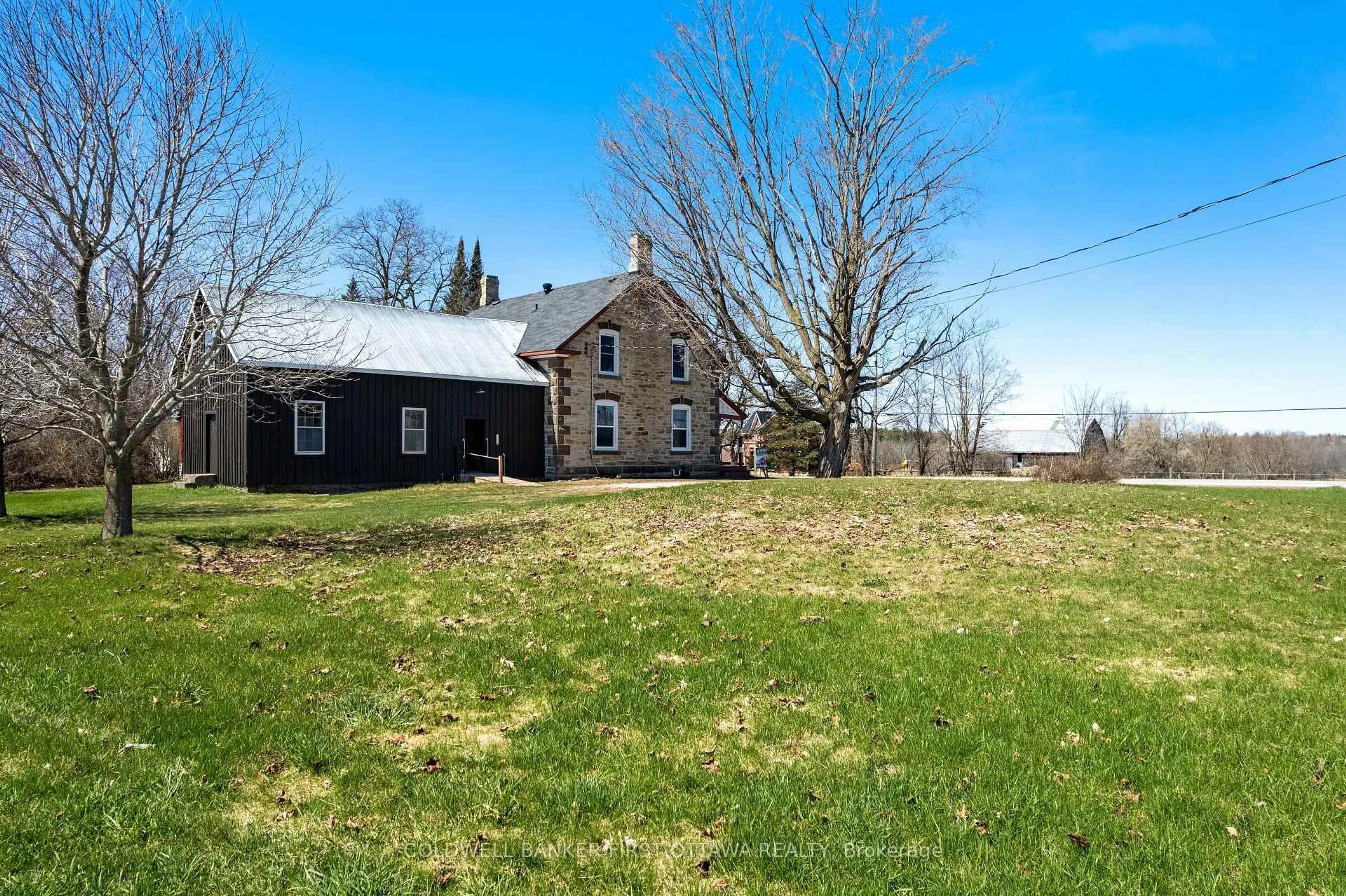 A pic from outside/outdoor area/front of a property/back of a property/a pic from drone, building for 2061 Christie Lake Rd, Perth Ontario K7H 3C6