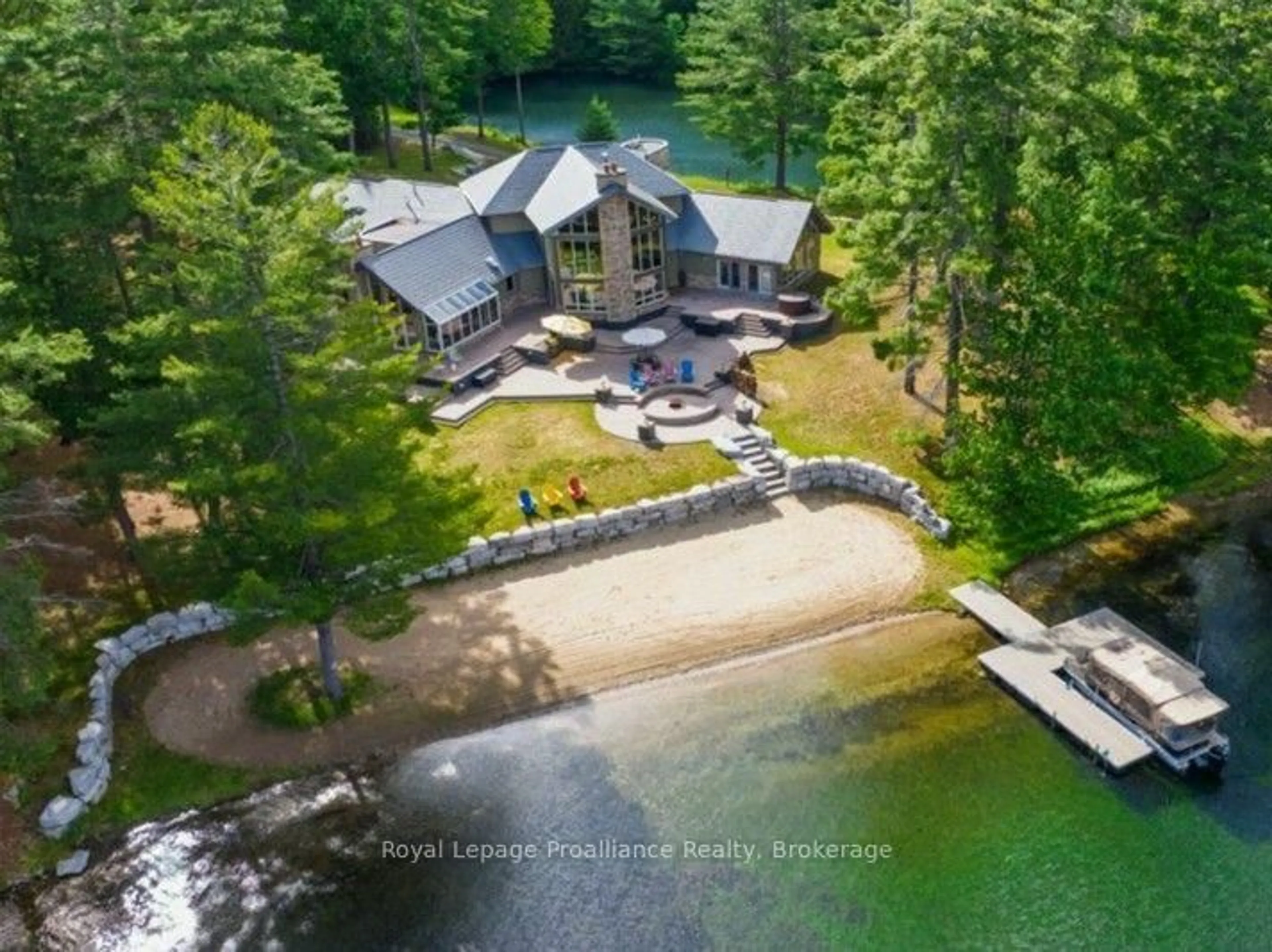 A pic from outside/outdoor area/front of a property/back of a property/a pic from drone, water/lake/river/ocean view for 1003 A & B Sunrise Beach Lane, Cloyne Ontario K0H 1K0