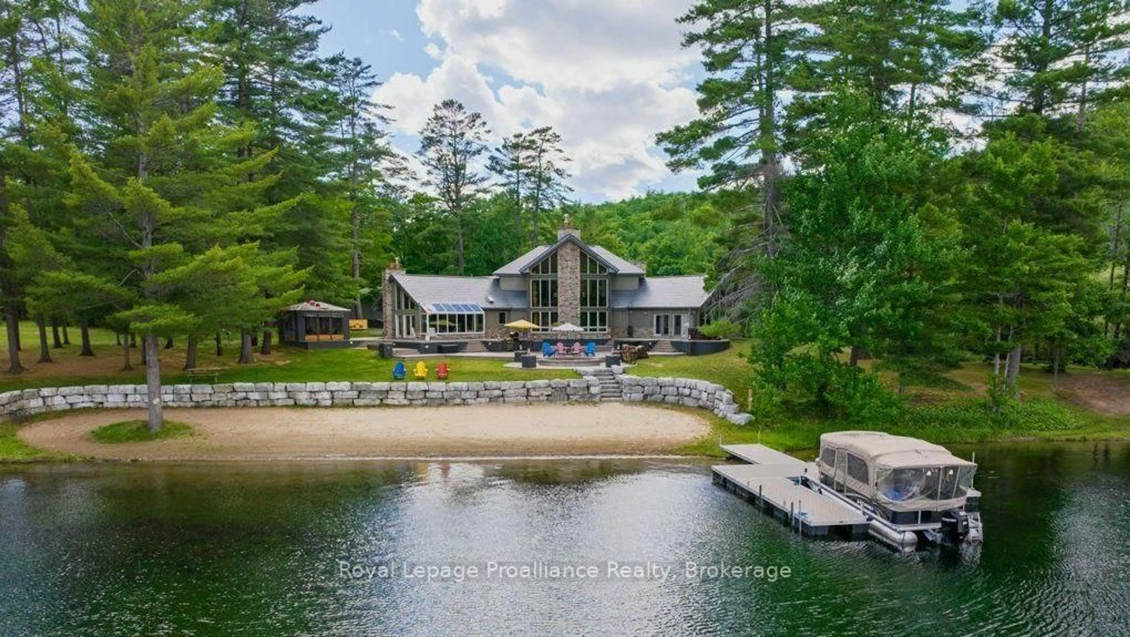 A pic from outside/outdoor area/front of a property/back of a property/a pic from drone, water/lake/river/ocean view for 1003 A & B Sunrise Beach Lane, Cloyne Ontario K0H 1K0