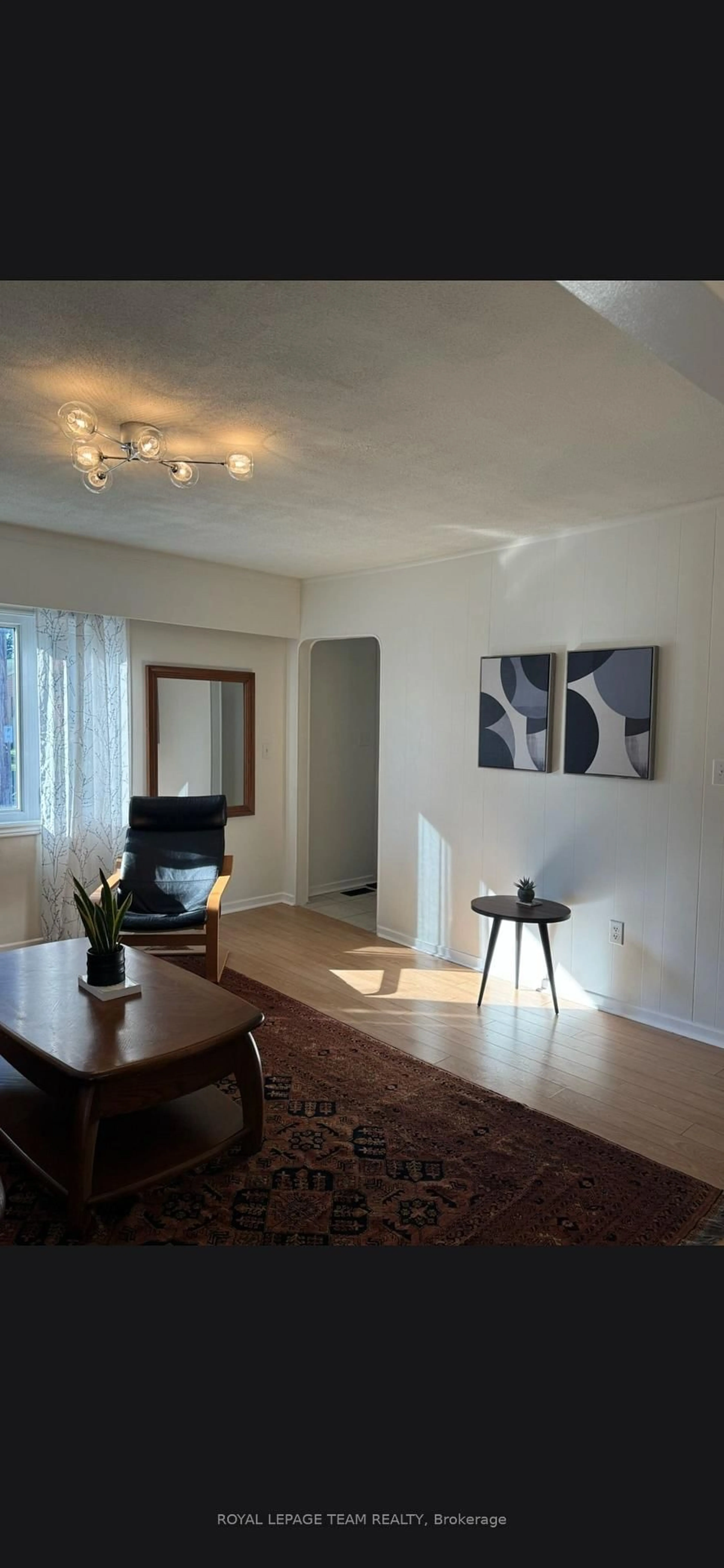 Living room with furniture, wood/laminate floor for 88 North St, Perth Ontario K7H 2T3