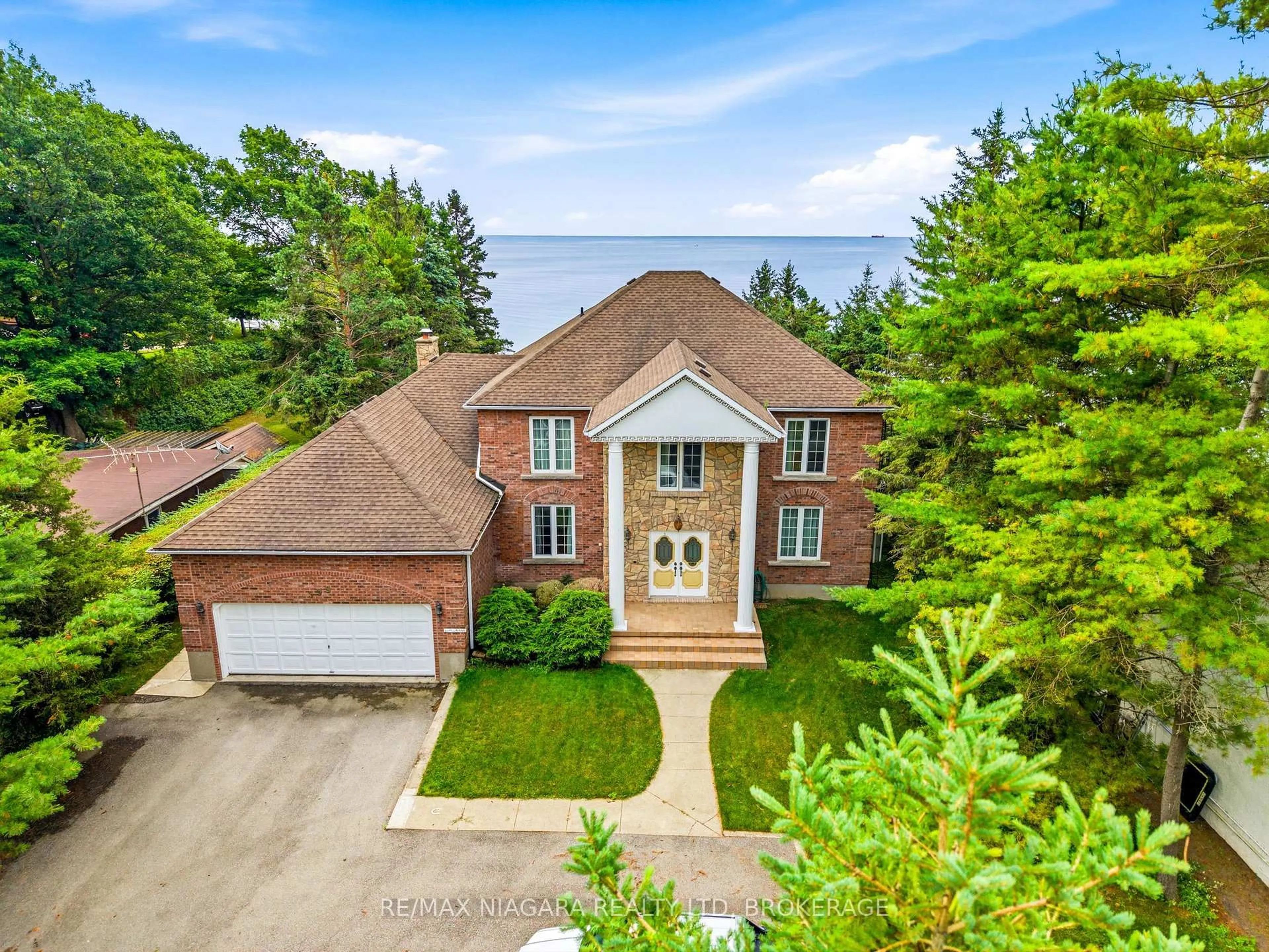 A pic from outside/outdoor area/front of a property/back of a property/a pic from drone, street for 599 Lakeshore Rd, Port Colborne Ontario L3K 5V3