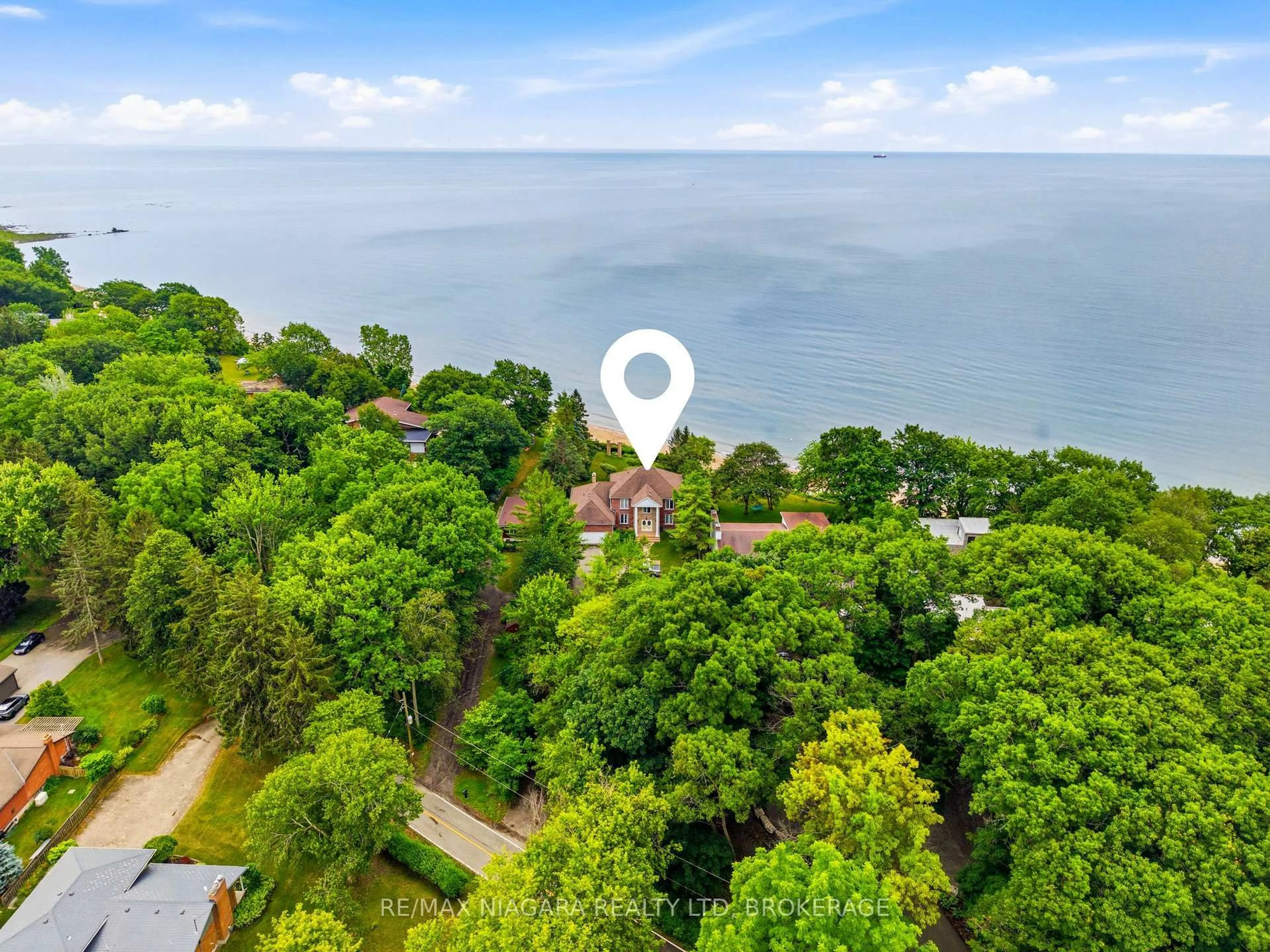A pic from outside/outdoor area/front of a property/back of a property/a pic from drone, water/lake/river/ocean view for 599 Lakeshore Rd, Port Colborne Ontario L3K 5V3