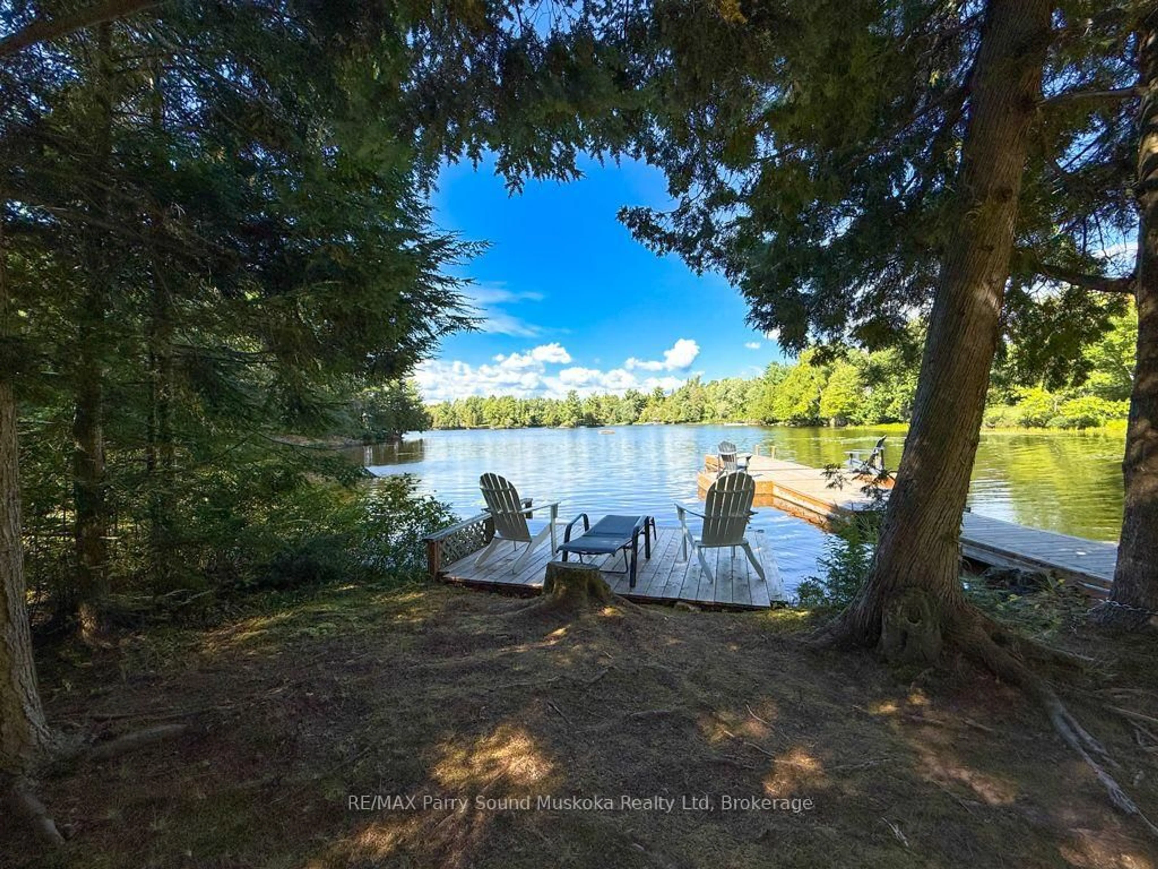 A pic from outside/outdoor area/front of a property/back of a property/a pic from drone, water/lake/river/ocean view for 127 BURNETTS Rd, McKellar Ontario P2A 0B5
