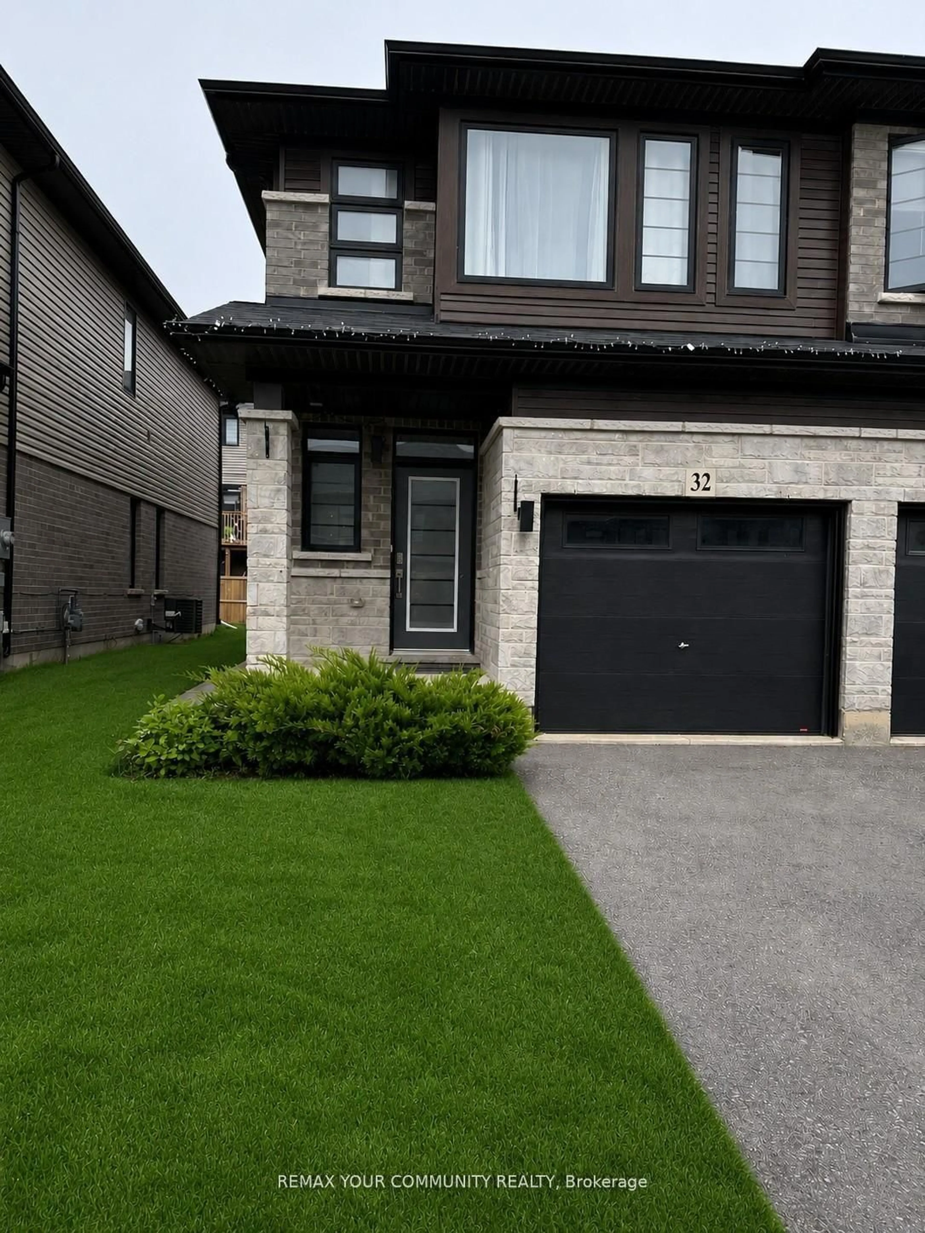 Home with vinyl exterior material, street for 32 June Callwood Way, Brantford Ontario N3T 0T7