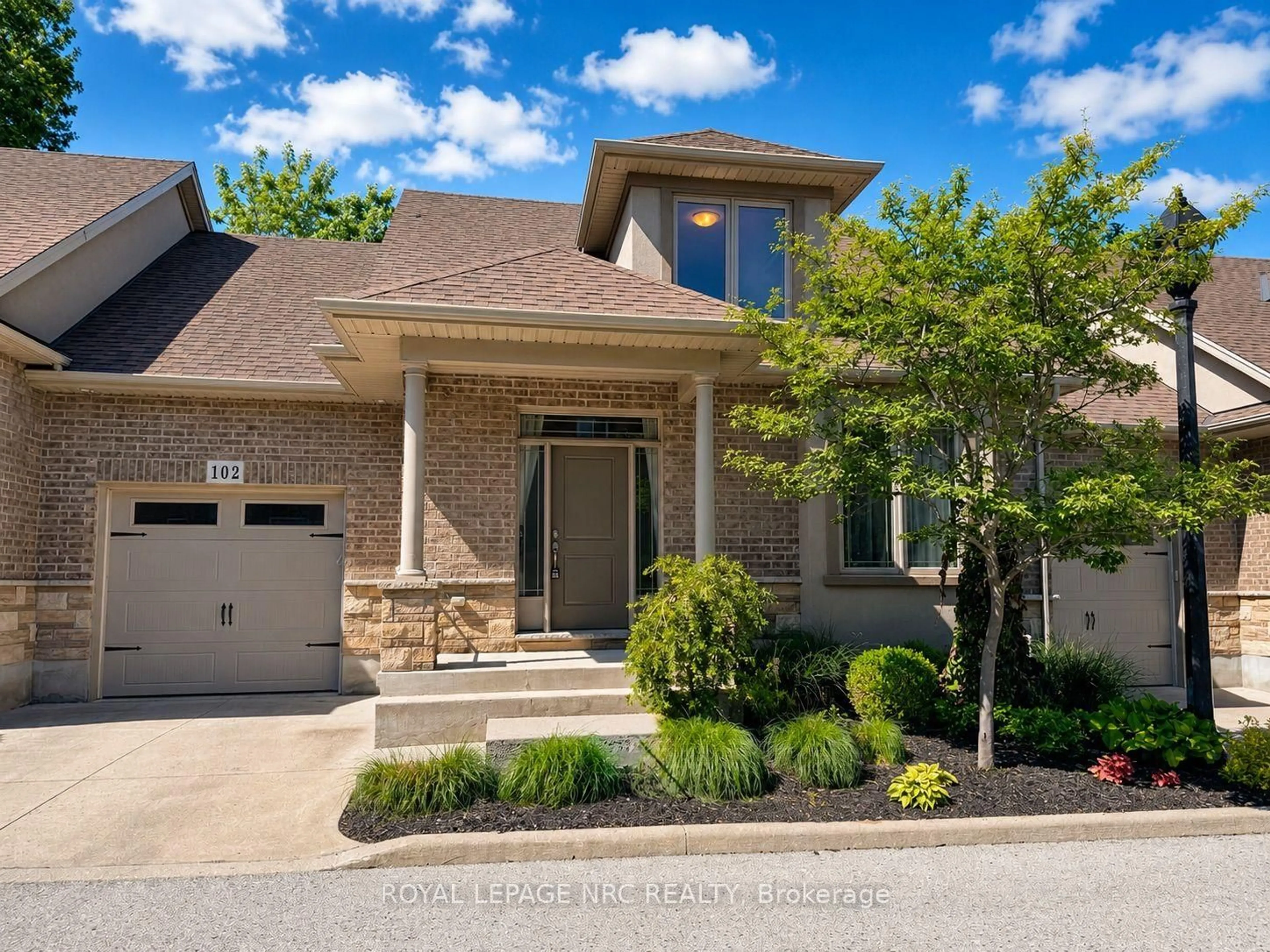 Home with brick exterior material, street for 6186 Dorchester Rd #2, Niagara Falls Ontario L2G 5T2