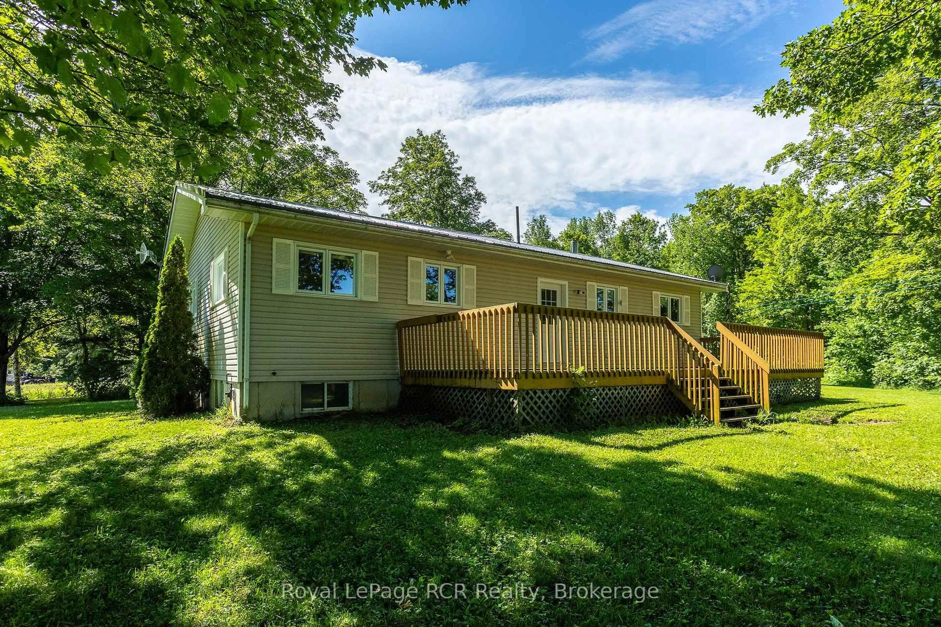 A pic from outside/outdoor area/front of a property/back of a property/a pic from drone, unknown for 544267 Bells Lake Rd, West Grey Ontario N0C 1H0