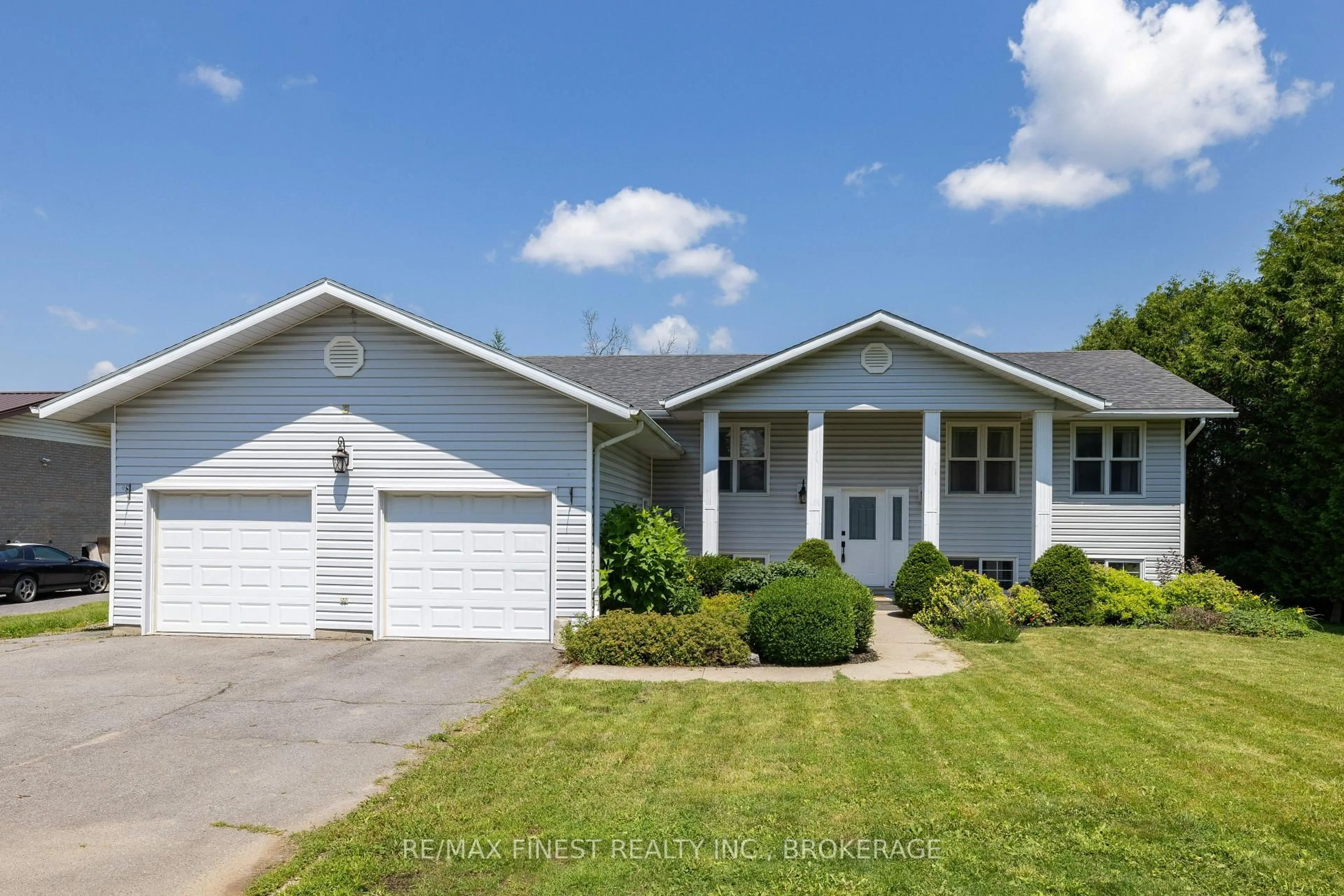 Home with vinyl exterior material, street for 214 Main St, Bissett Creek Ontario K0H 2H0