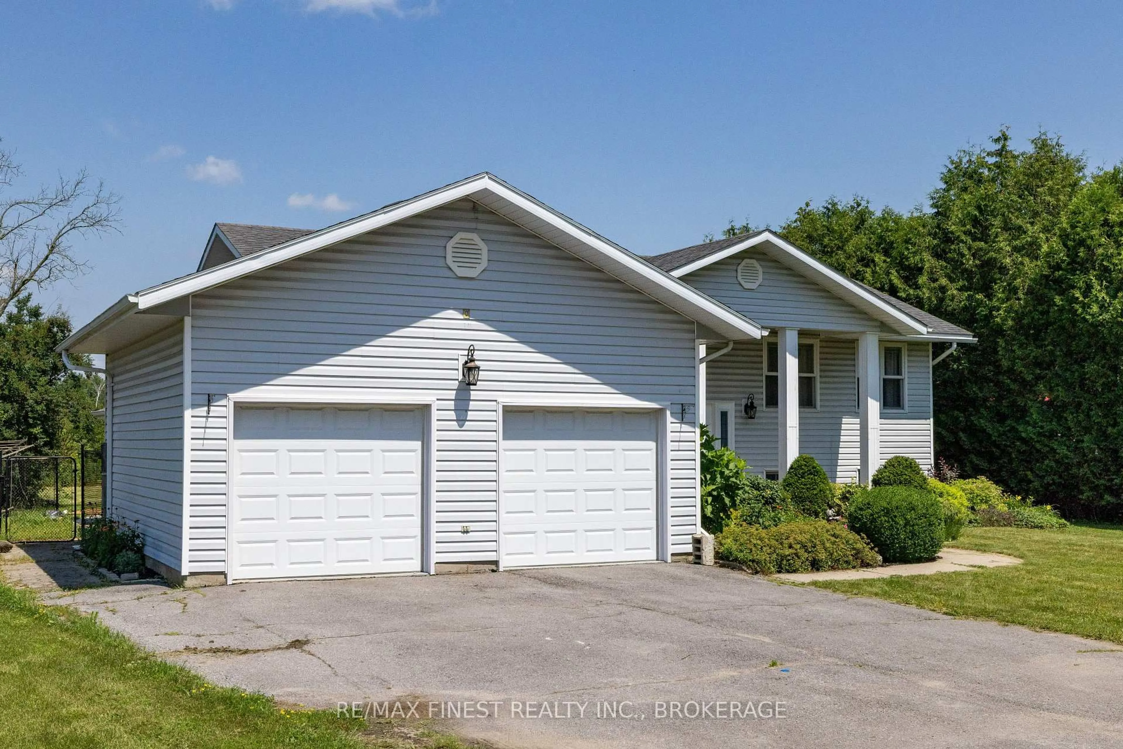Home with vinyl exterior material, street for 214 Main St, Bissett Creek Ontario K0H 2H0