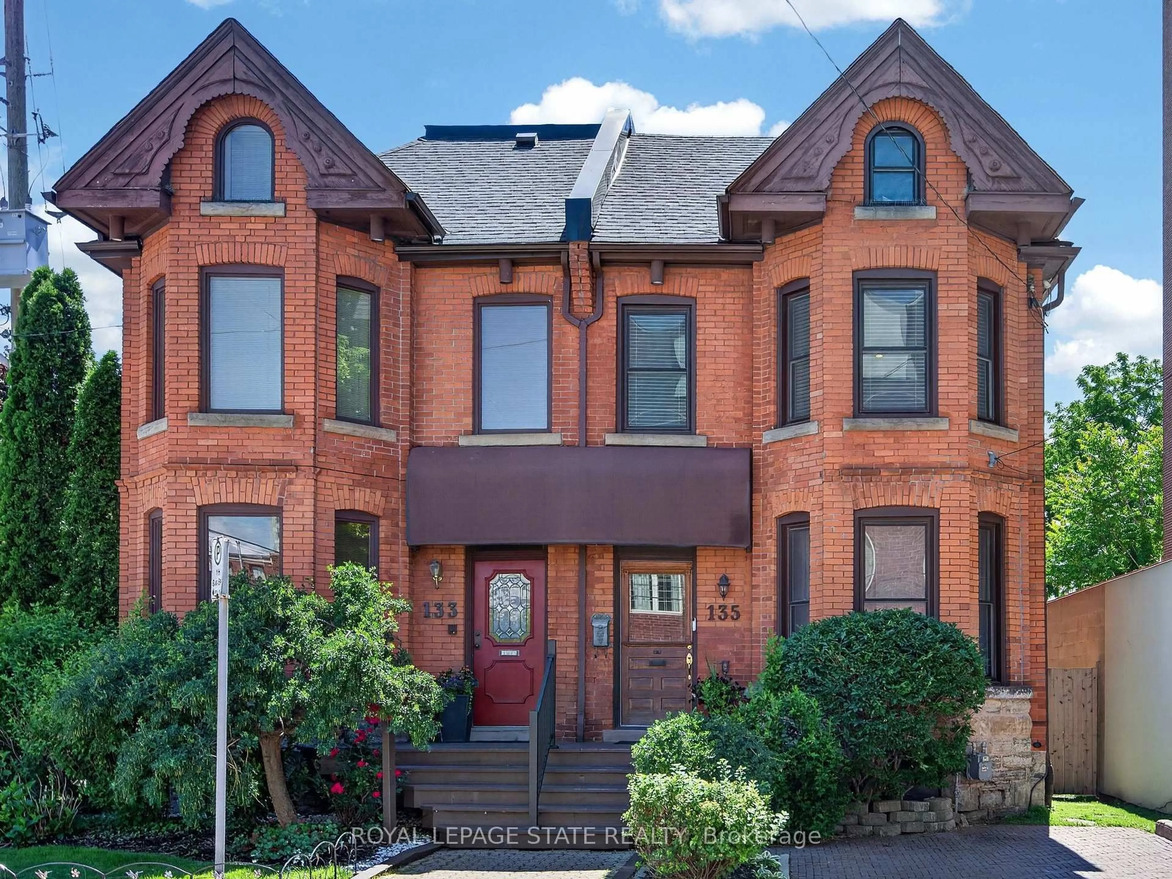 Home with brick exterior material, street for 135 Catharine St, Hamilton Ontario L8N 2J6