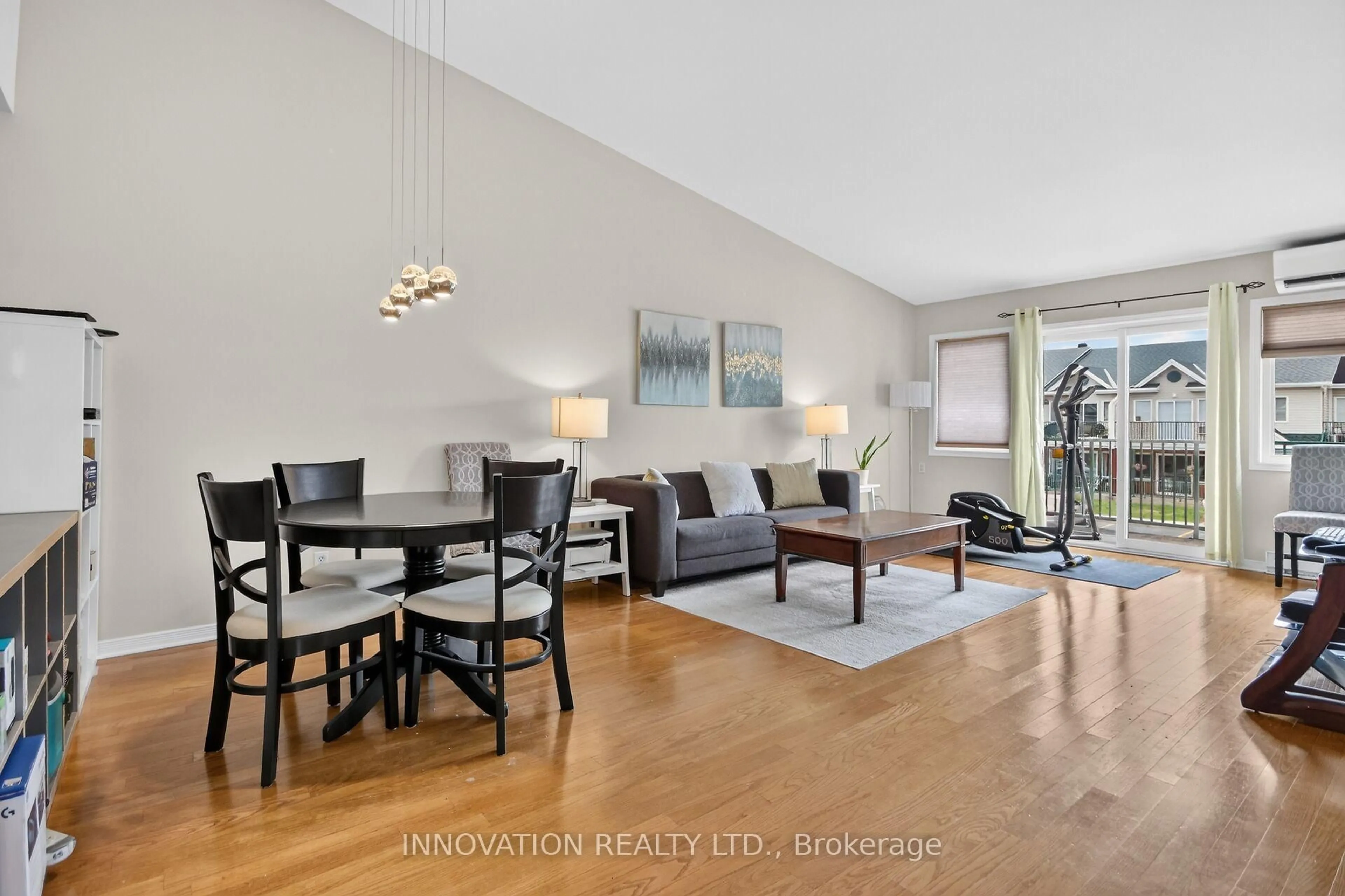 Living room with furniture, wood/laminate floor for 2923 Laurier St #408, Clarence-Rockland Ontario K4K 1T8