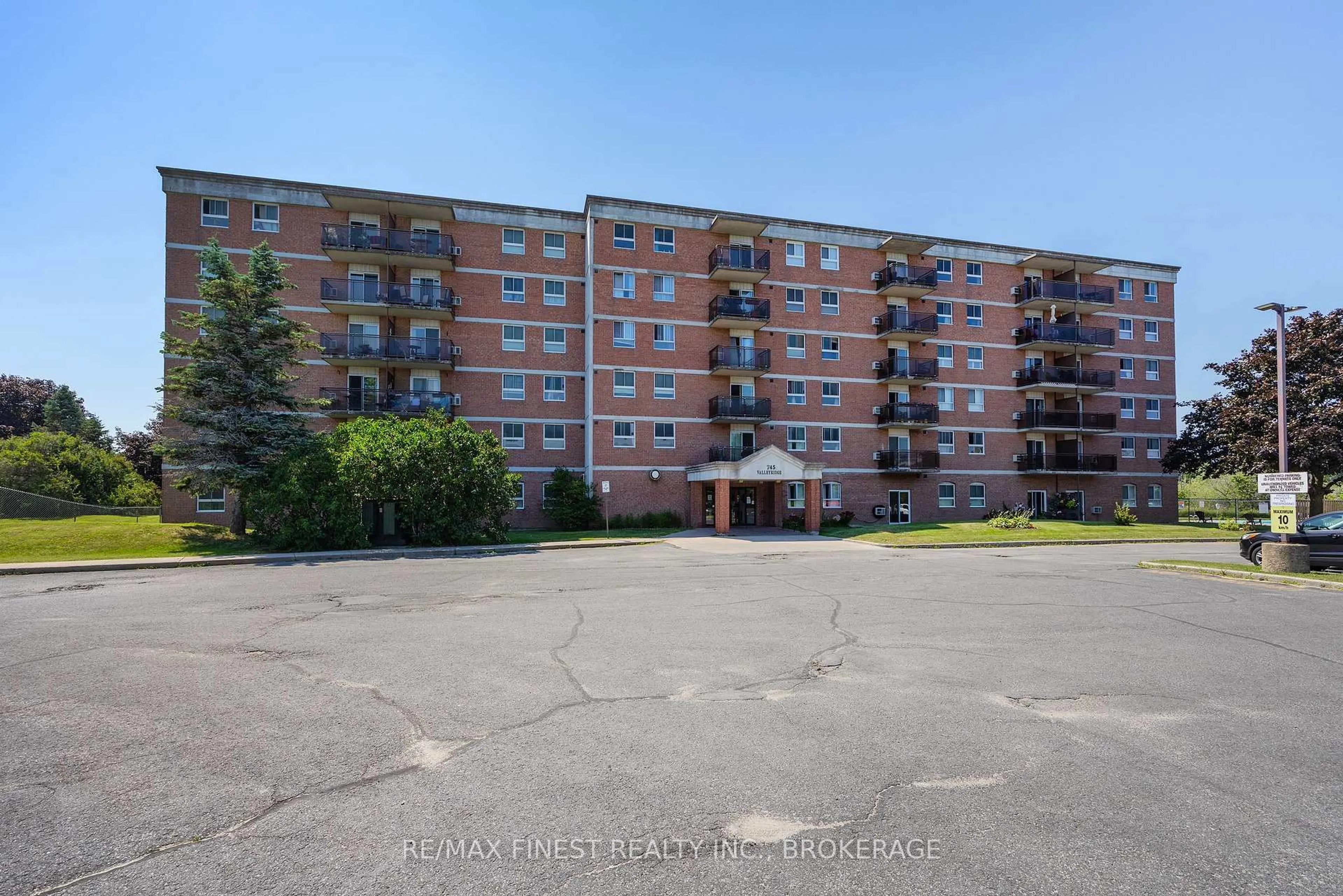 A pic from outside/outdoor area/front of a property/back of a property/a pic from drone, building for 745 Davis Dr #101, Kingston Ontario K7M 8J4