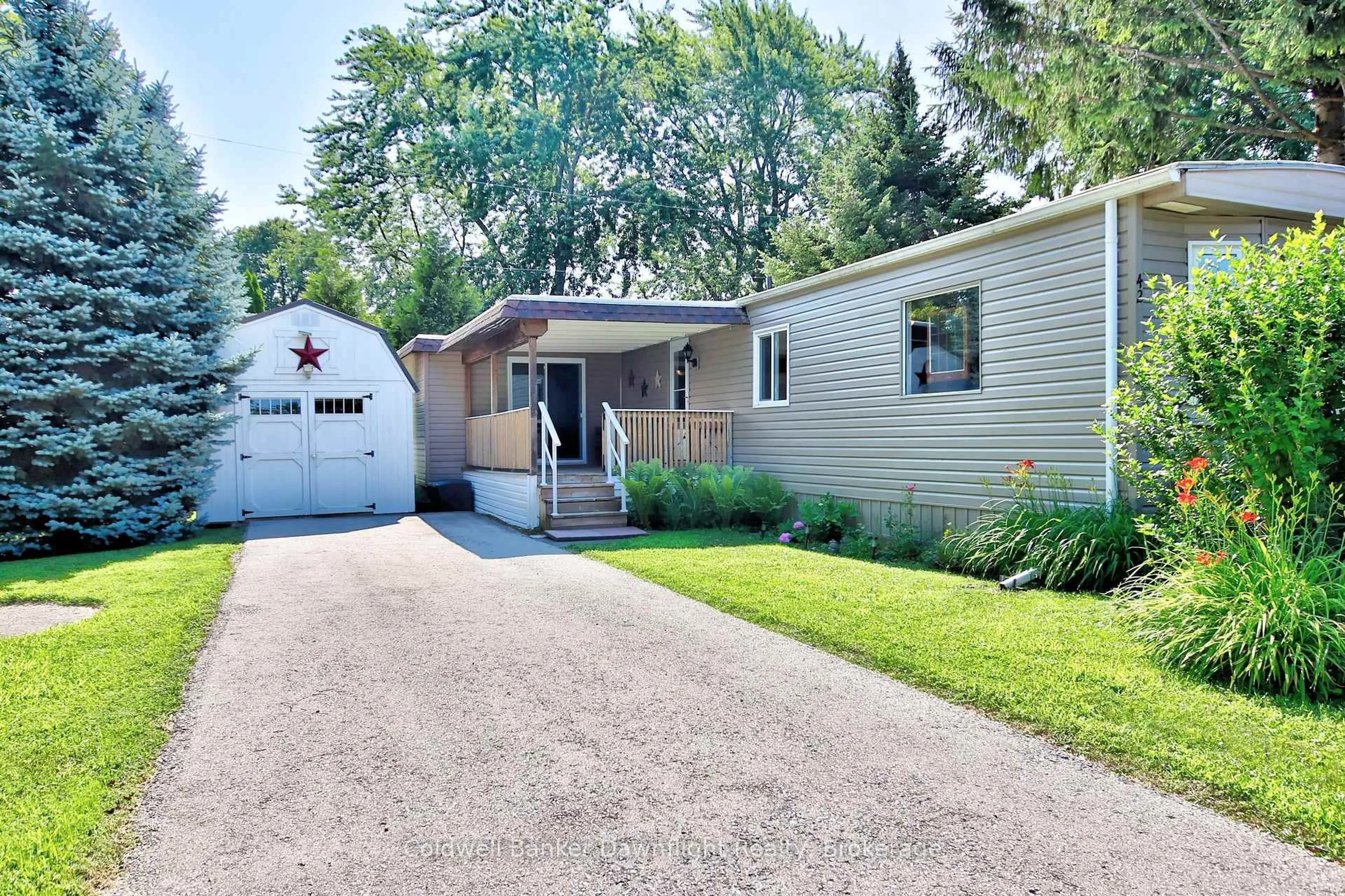 Home with vinyl exterior material, street for 42 Cranberry Dr, Ashfield-Colborne-Wawanosh Ontario N7A 3Y3