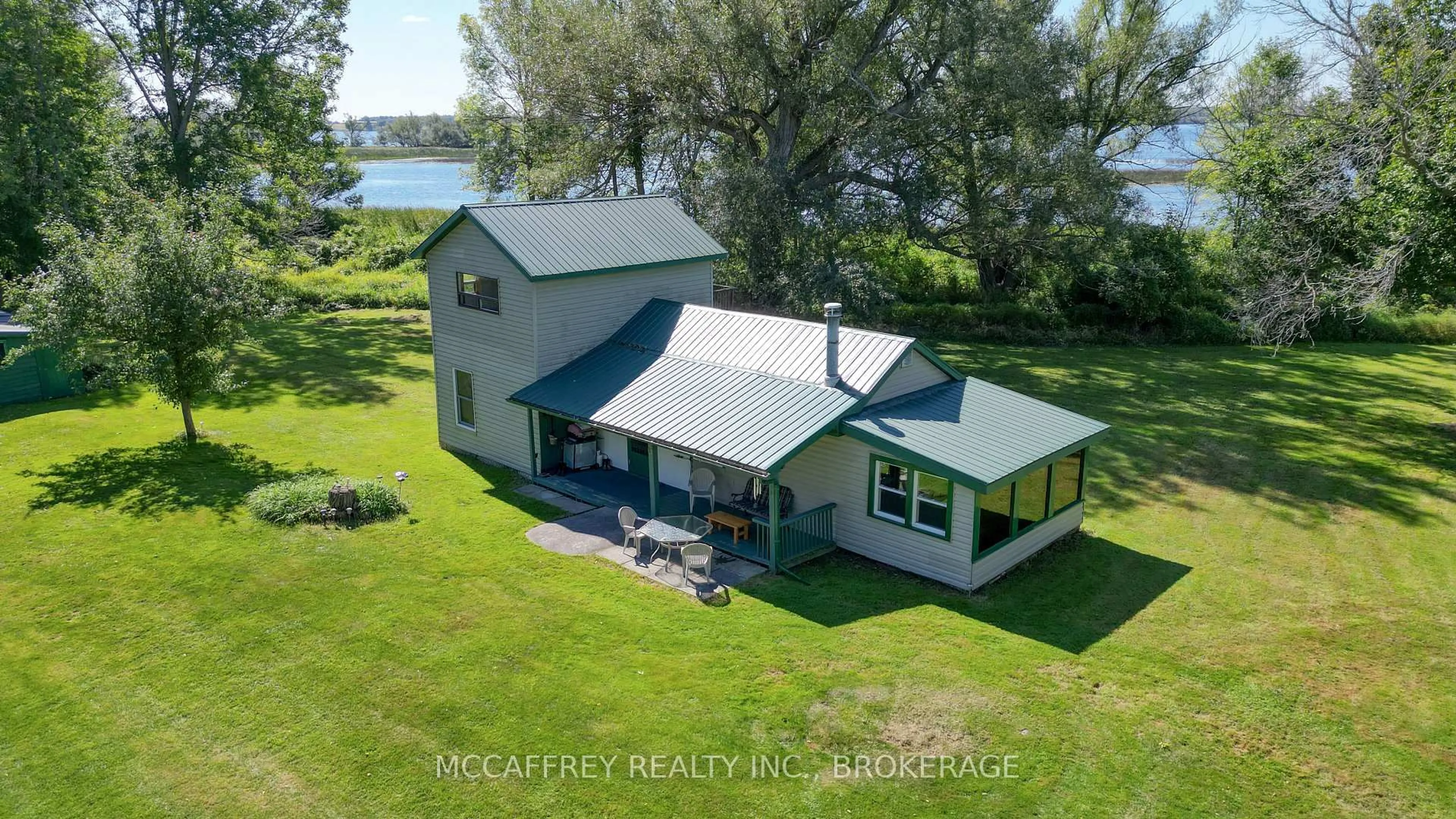A pic from outside/outdoor area/front of a property/back of a property/a pic from drone, water/lake/river/ocean view for 1280 GALT St, Bath Ontario K0H 1G0