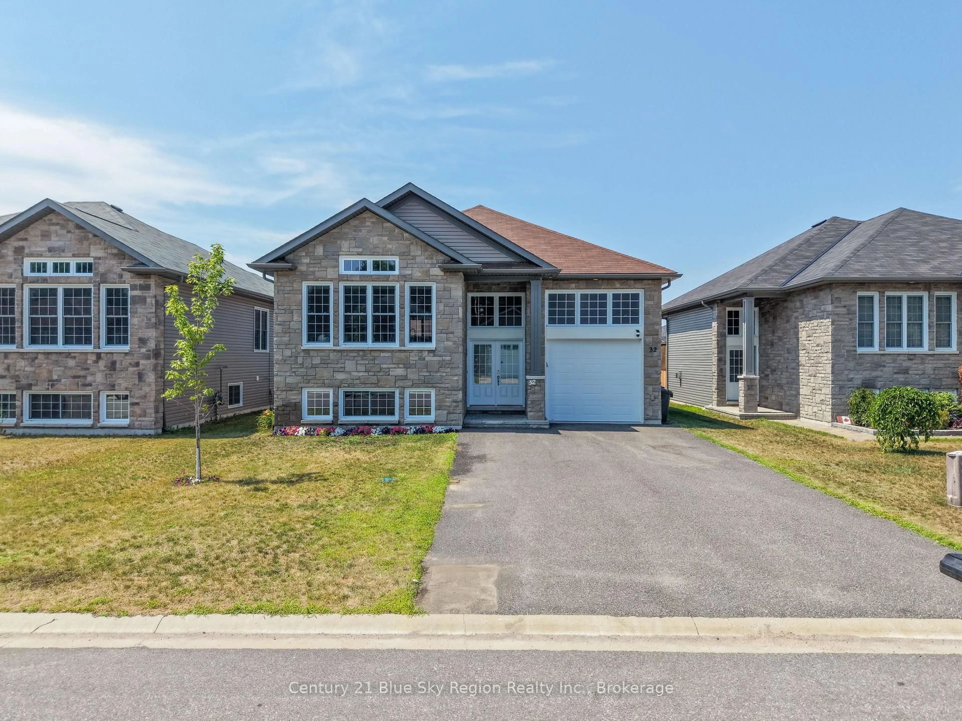 Home with brick exterior material, street for 32 Trillium Dr, North Bay Ontario P1A 0G6