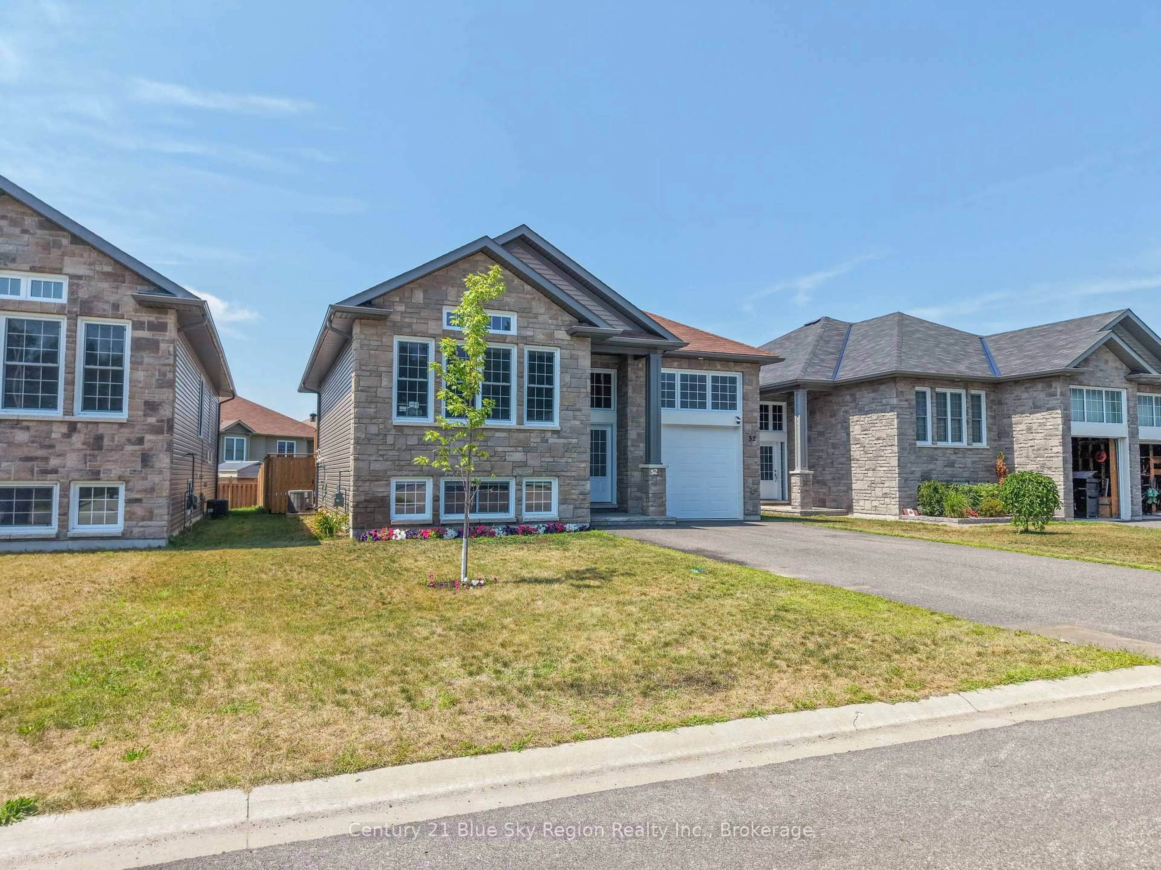 Home with brick exterior material, street for 32 Trillium Dr, North Bay Ontario P1A 0G6