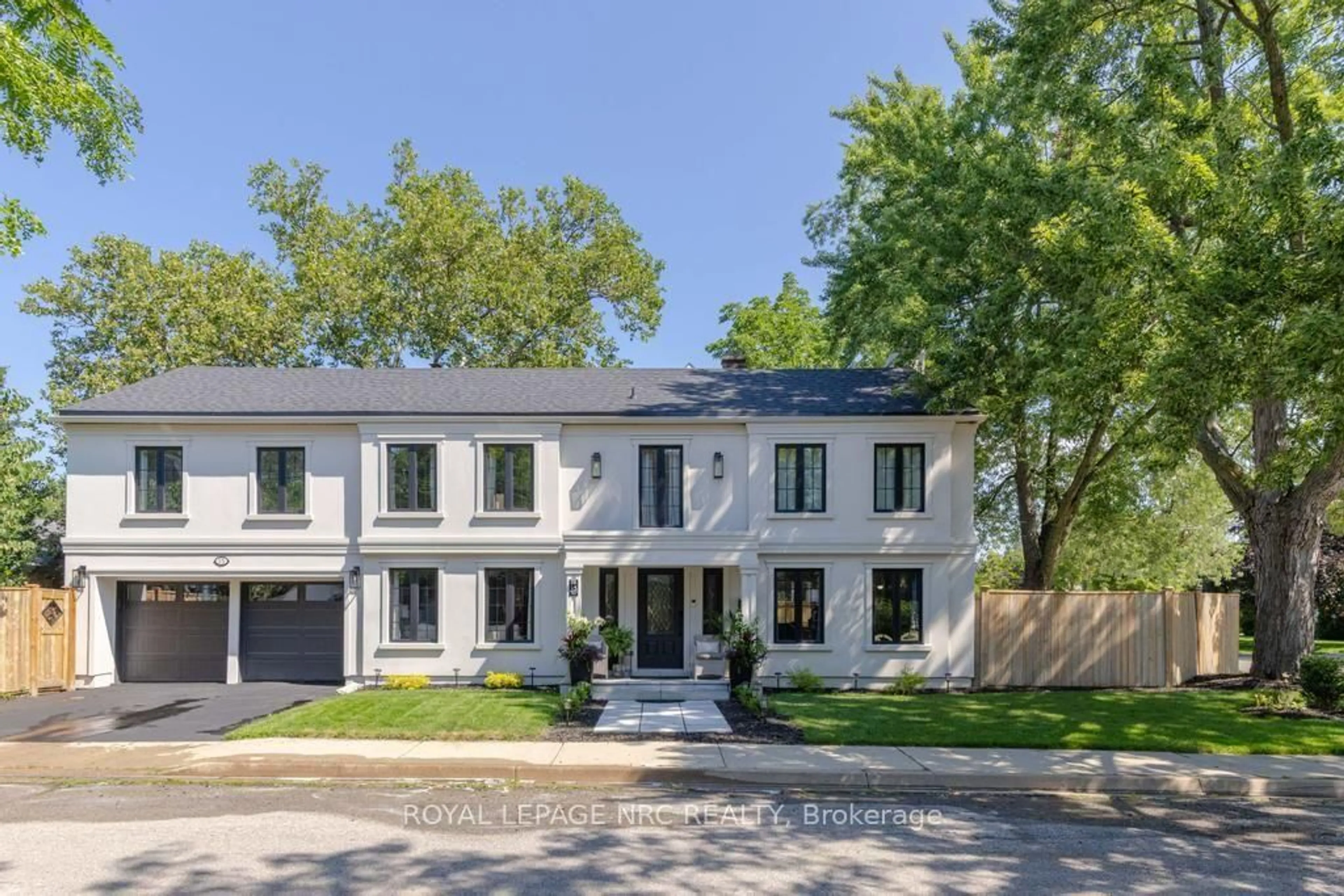 Home with brick exterior material, street for 15 Wychwood Rd, St. Catharines Ontario L2R 3S1