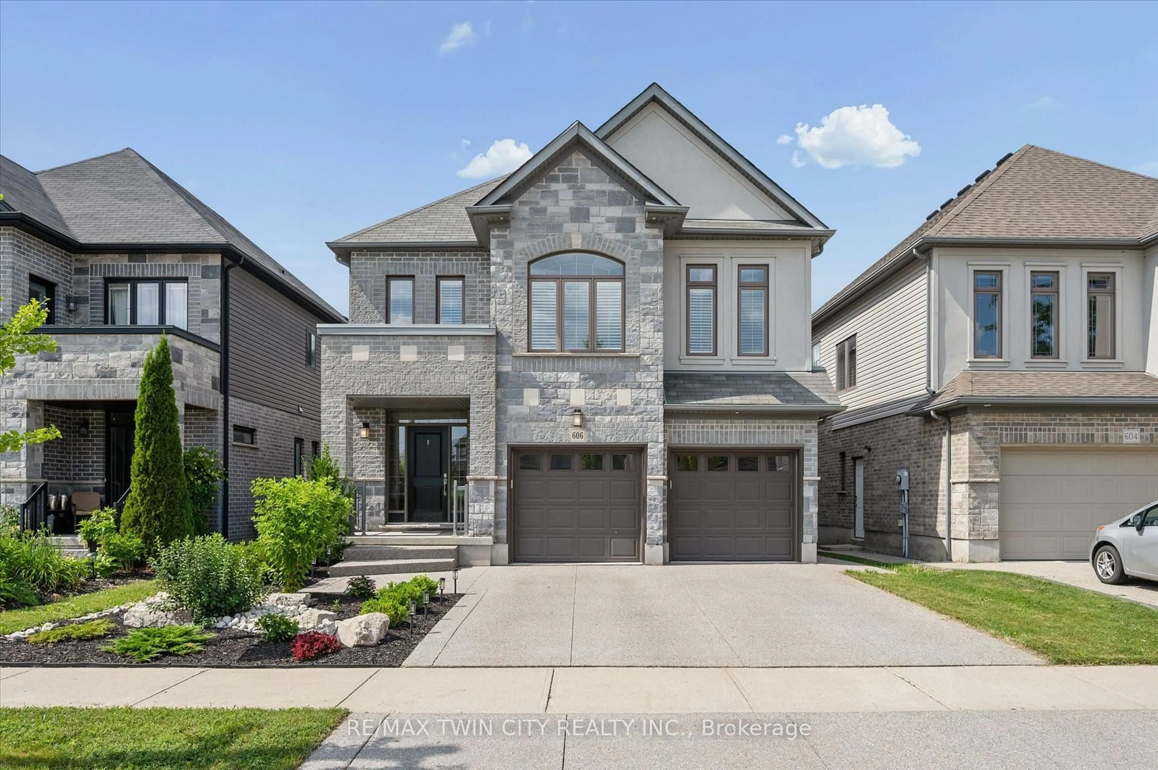 Home with brick exterior material, street for 606 Pinery Tr, Waterloo Ontario N2V 2Y6