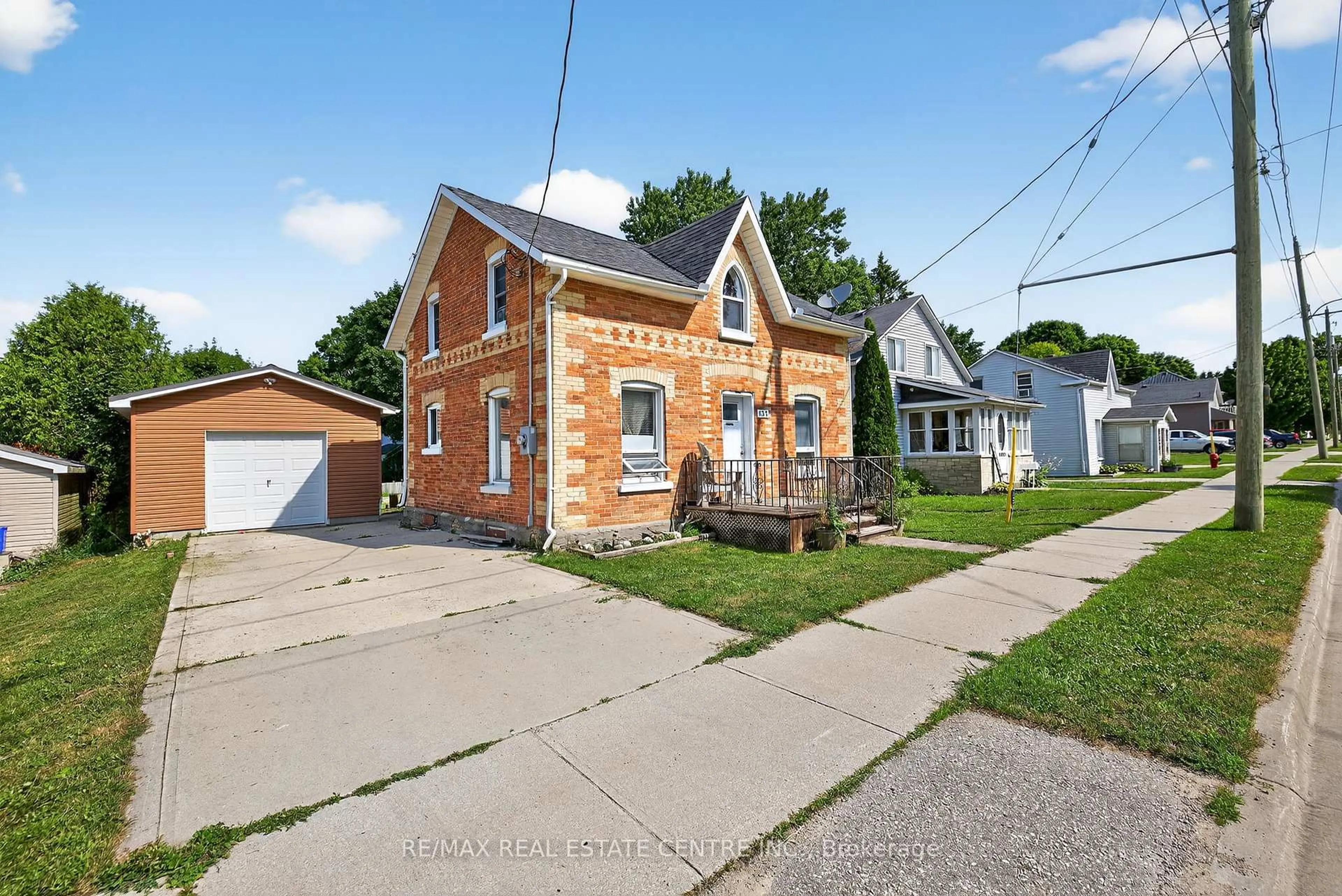 Home with brick exterior material, street for 135 Frederick St, Wellington North Ontario N0G 1A0
