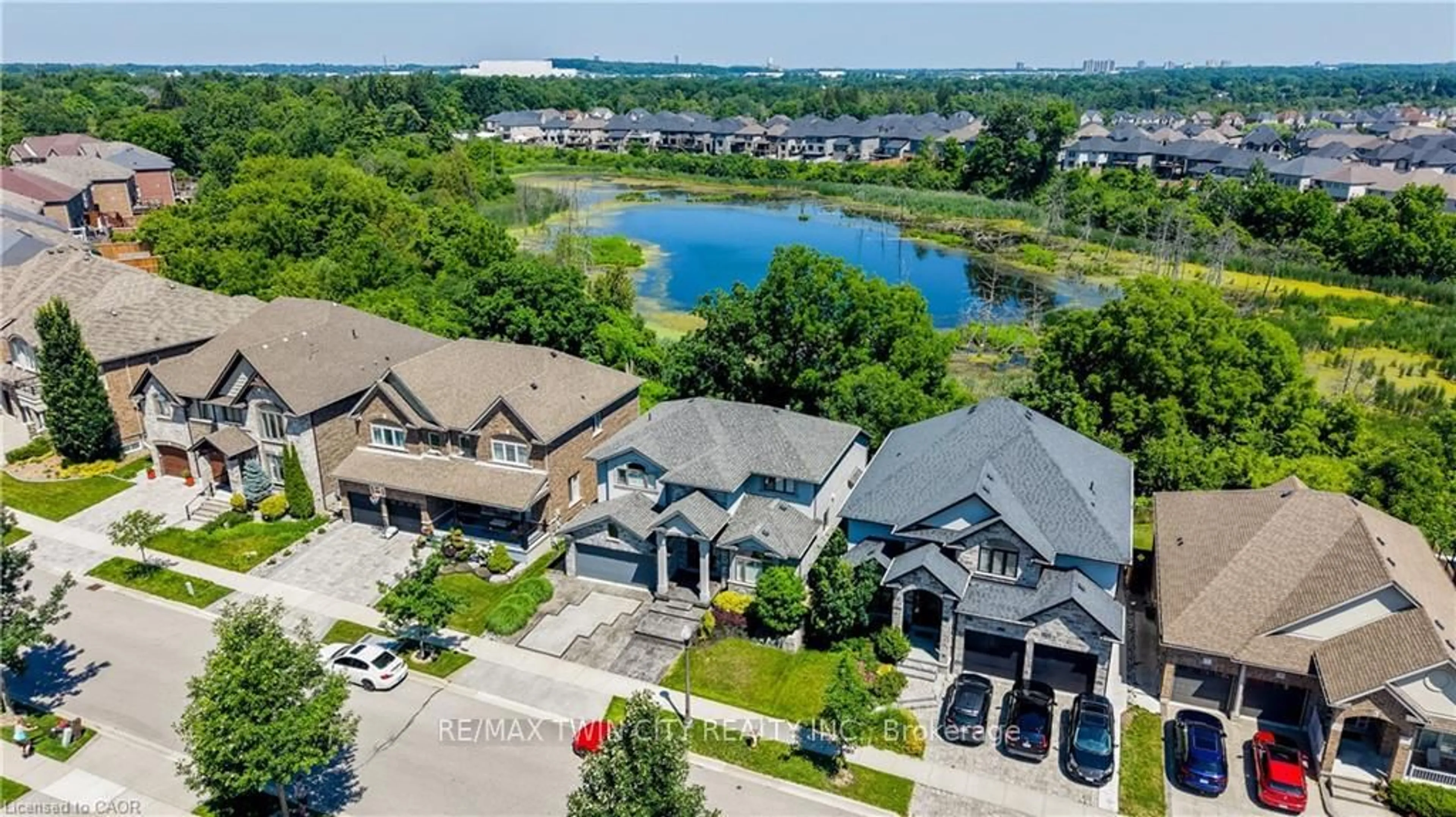 A pic from outside/outdoor area/front of a property/back of a property/a pic from drone, water/lake/river/ocean view for 248 EVENS POND Cres, Kitchener Ontario N2R 0B7