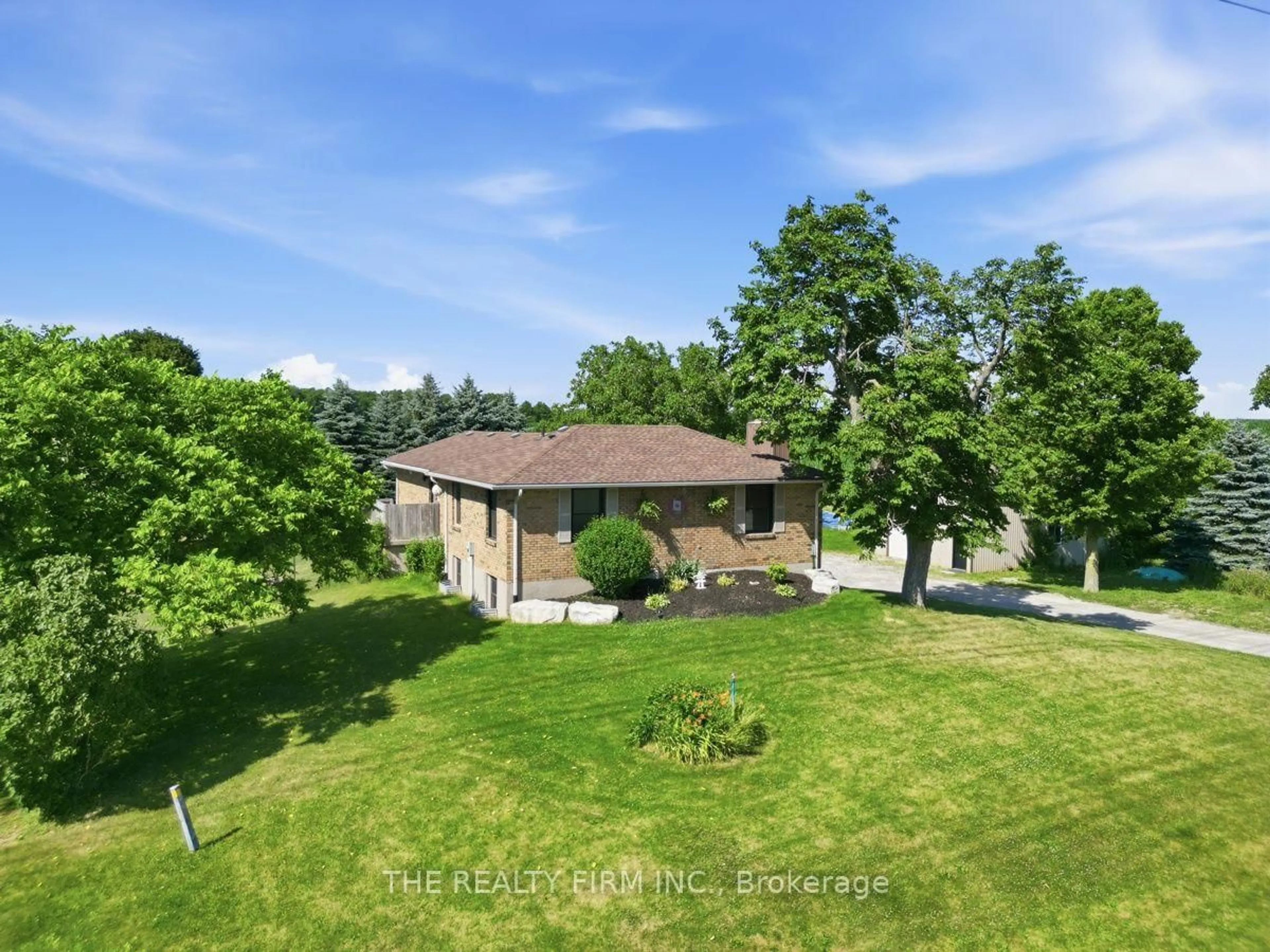 A pic from outside/outdoor area/front of a property/back of a property/a pic from drone, water/lake/river/ocean view for 808 Elginfield Rd, North Middlesex Ontario N0M 2K0